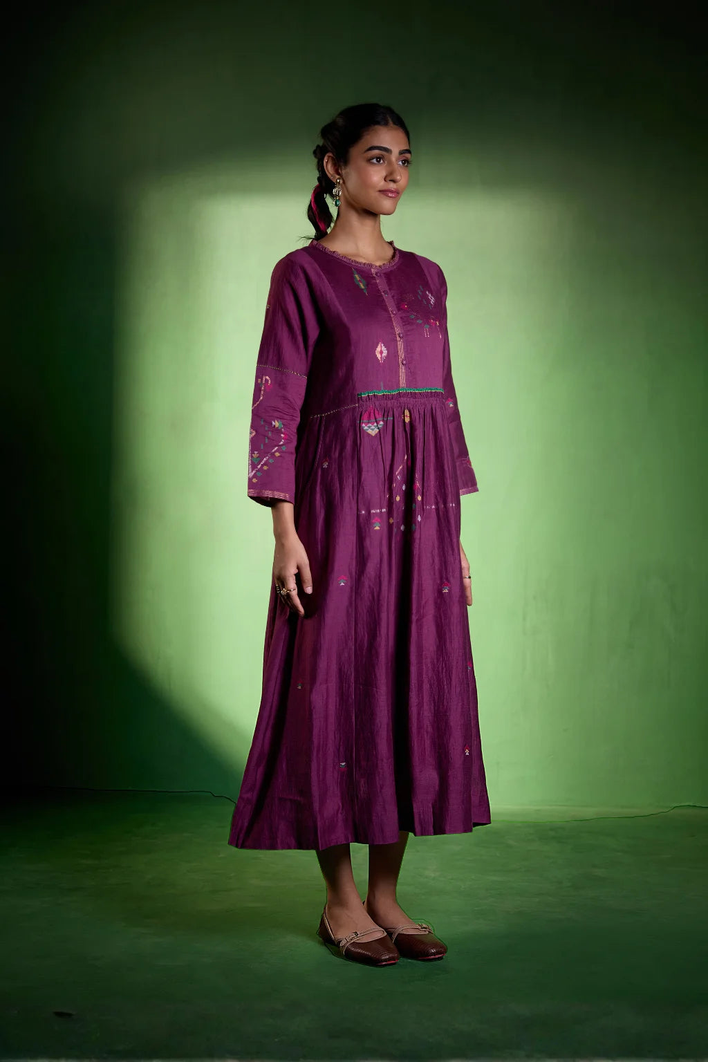 Sarron Amrita Dress, plum purple silk-cotton Jamdani dress with geometric motifs and a gathered waist.