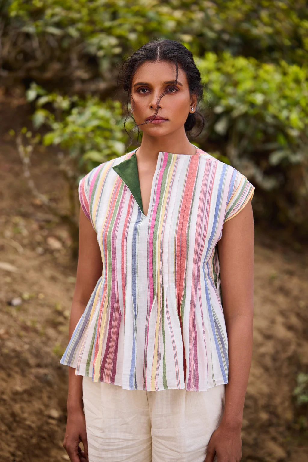 Sarron Banshori Top, short flared top in multicoloured striped handloom cotton with all-over tucks.