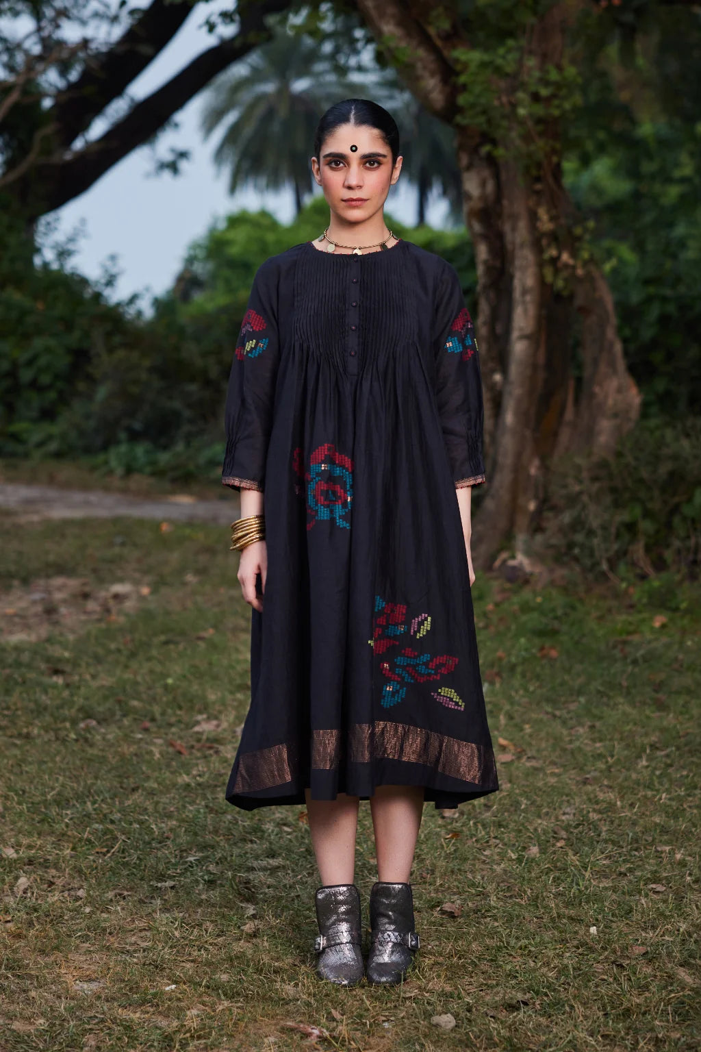Sarron Bindu Dress, black silk-cotton Jamdani dress with large multicoloured graph butas and pintucks.