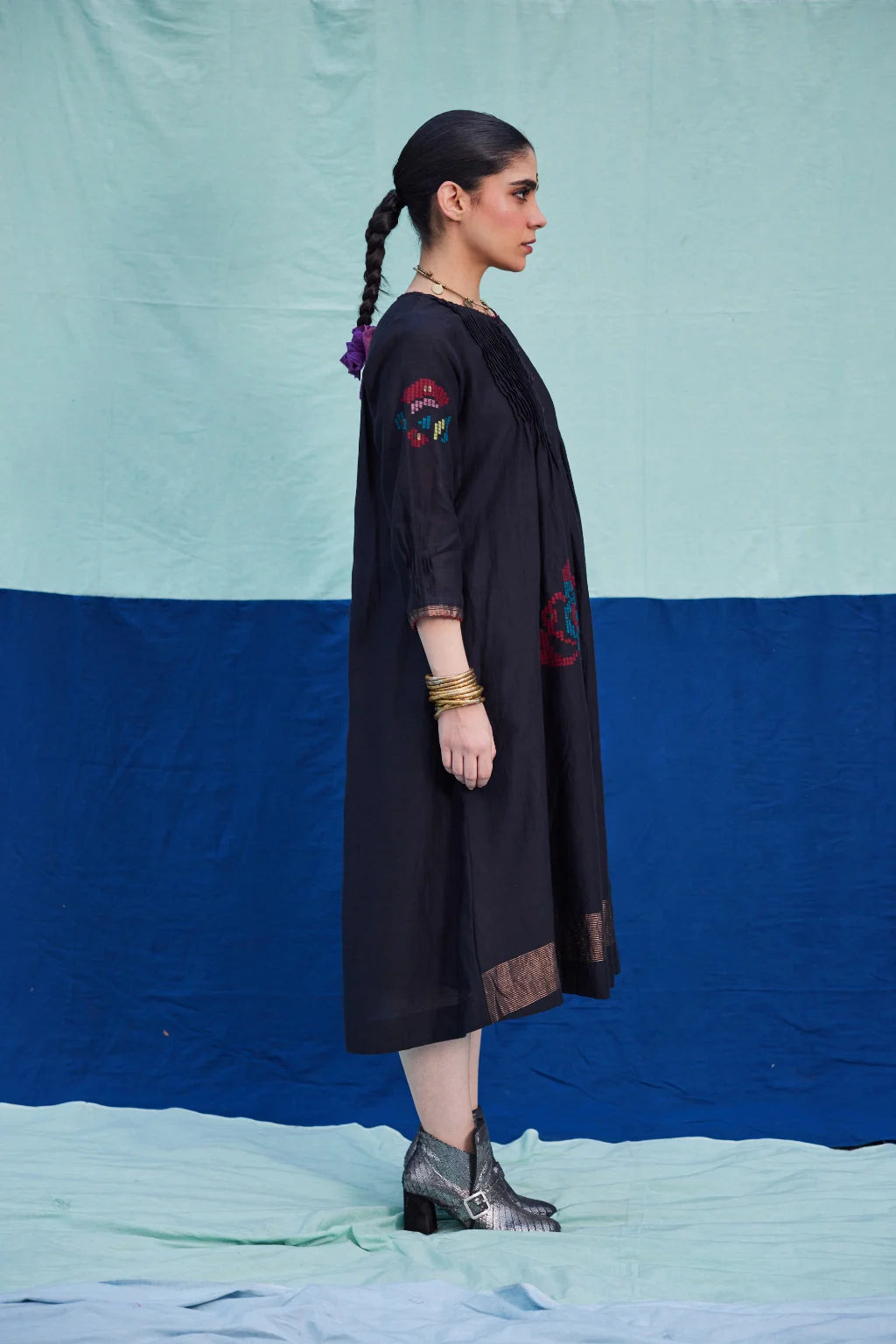 Sarron Bindu Dress, black silk-cotton Jamdani dress with large multicoloured graph butas and pintucks.