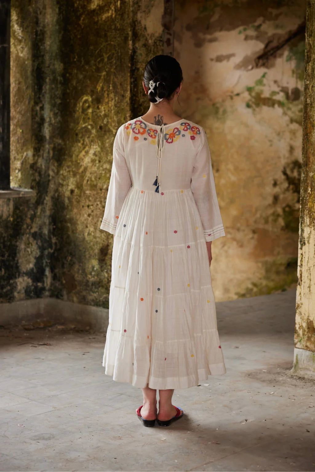 Sarron Gauri Dress, white tiered silk-cotton Jamdani dress with a floral placement motif and Kantha embroidery.