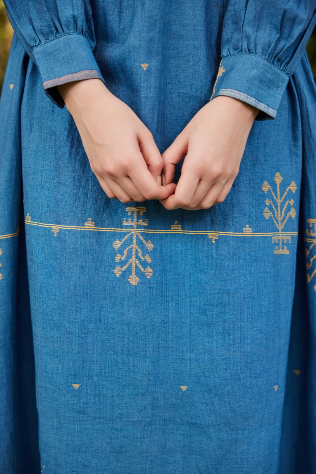 Sarron Jas Dress, blue silk-cotton Jamdani dress with small and large handwoven geometric motifs.