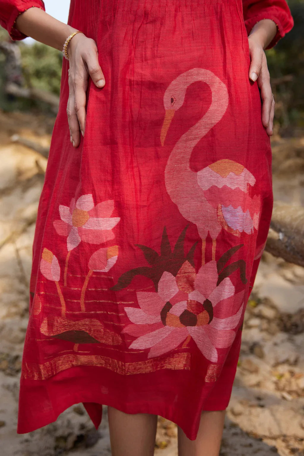 Sarron Jhuma Dress, red silk-cotton Jamdani dress with a handwoven flamingo and lotus-pond motif.