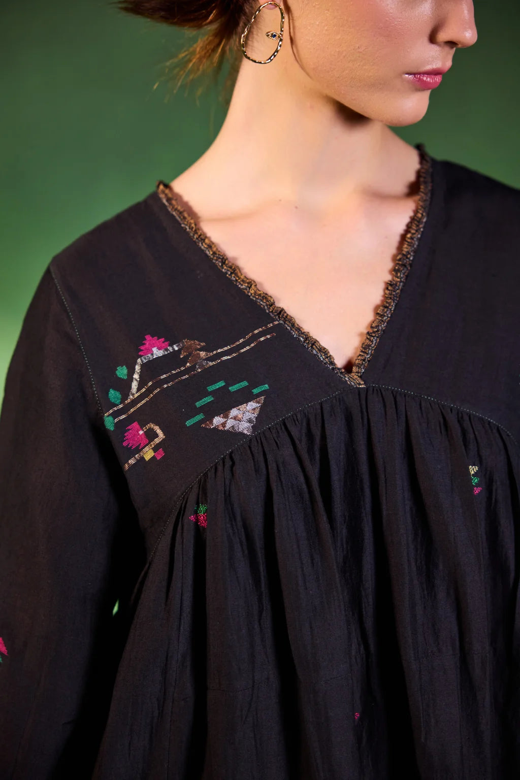 Sarron Kalindi Dress, black silk-cotton Jamdani dress with a V-neck and handwoven geometric motifs.