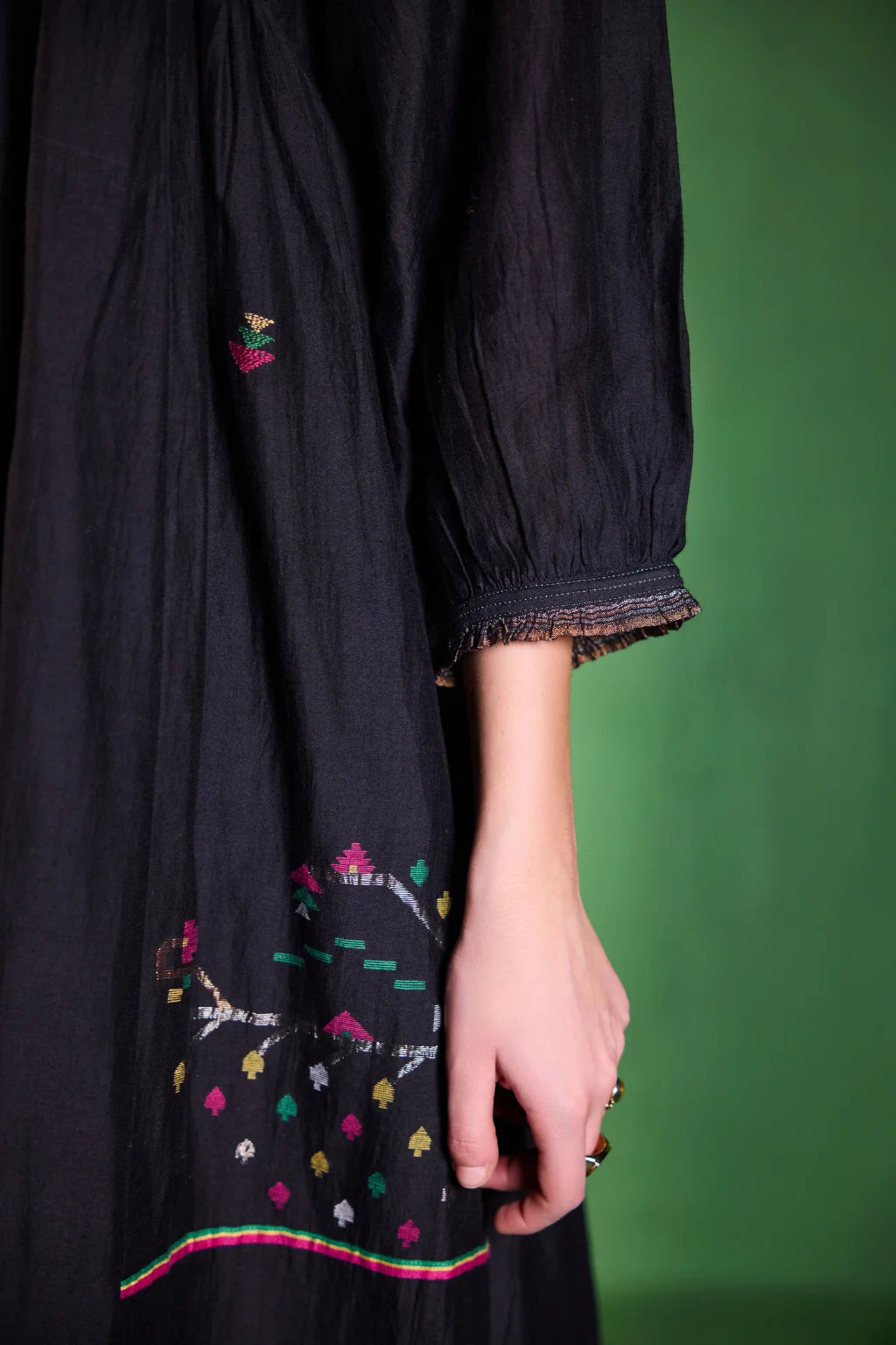Sarron Kalindi Dress, black silk-cotton Jamdani dress with a V-neck and handwoven geometric motifs.