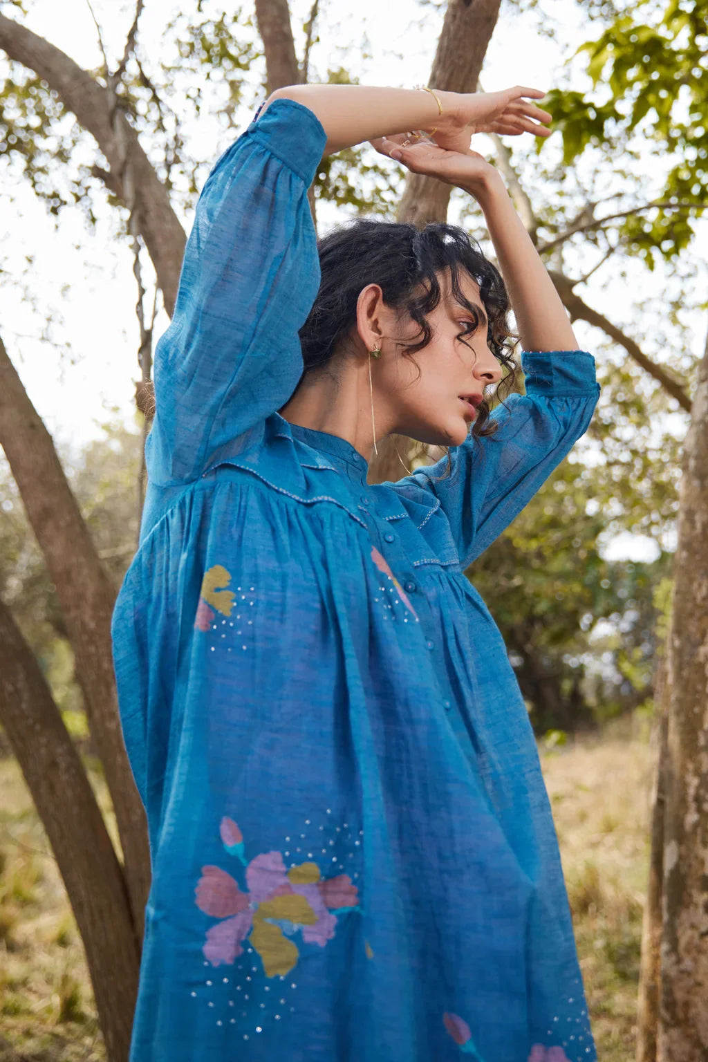 Sarron Krishna Dress, blue silk-cotton Jamdani dress with handwoven floral motifs and a pleated fall.