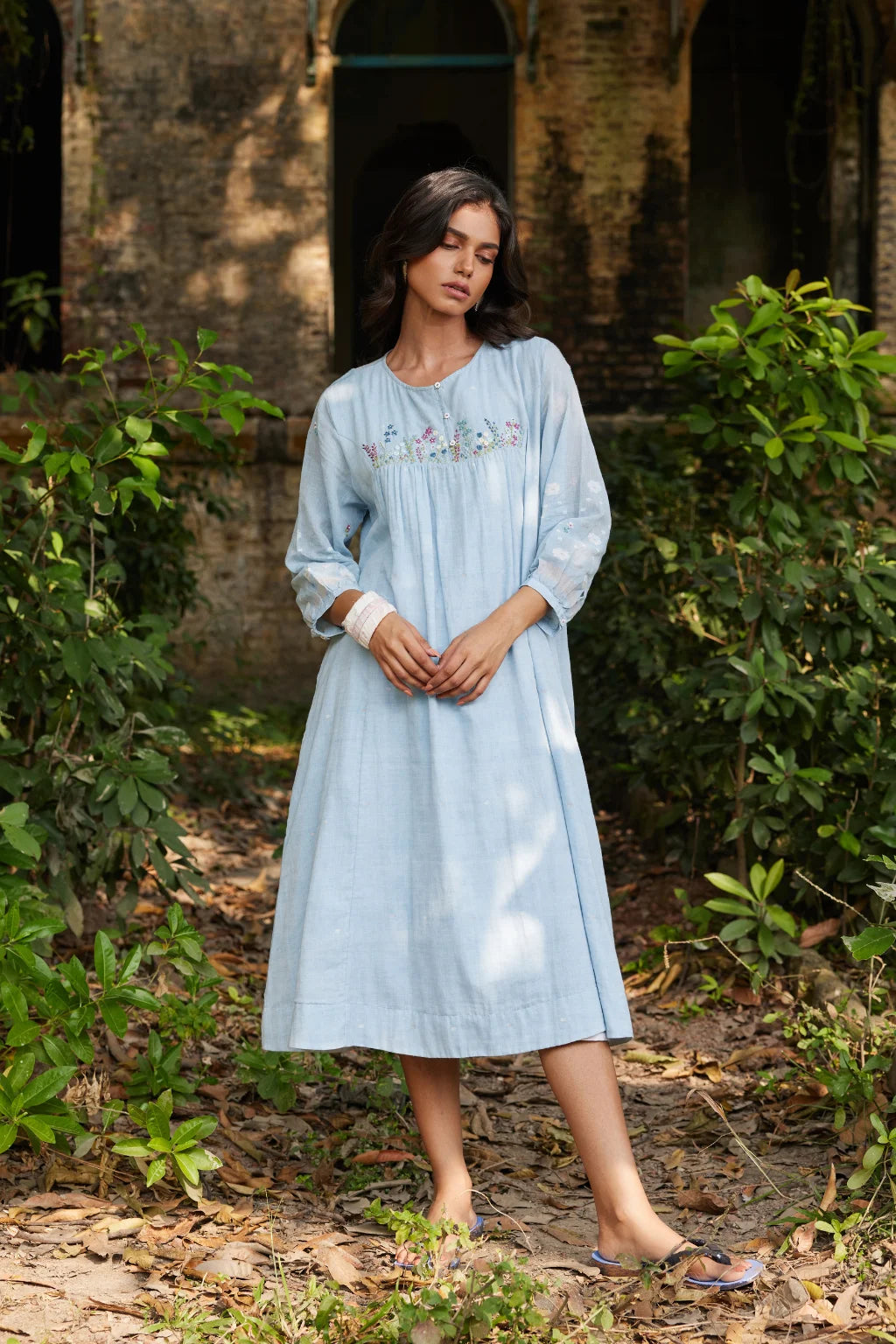 Sarron Kusum Dress, light blue cotton Jamdani dress with white and gold zari floral motifs.