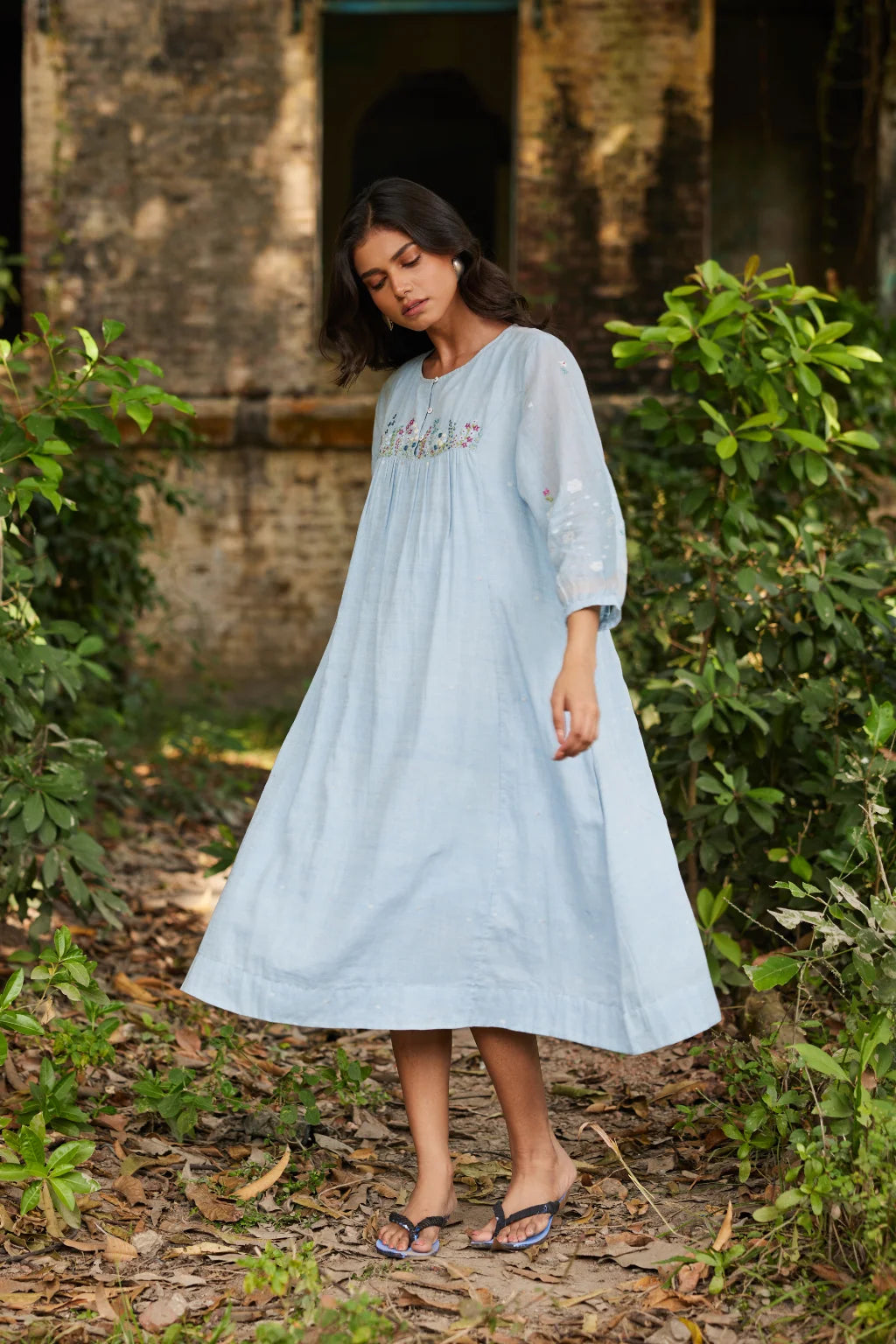 Sarron Kusum Dress, light blue cotton Jamdani dress with white and gold zari floral motifs.