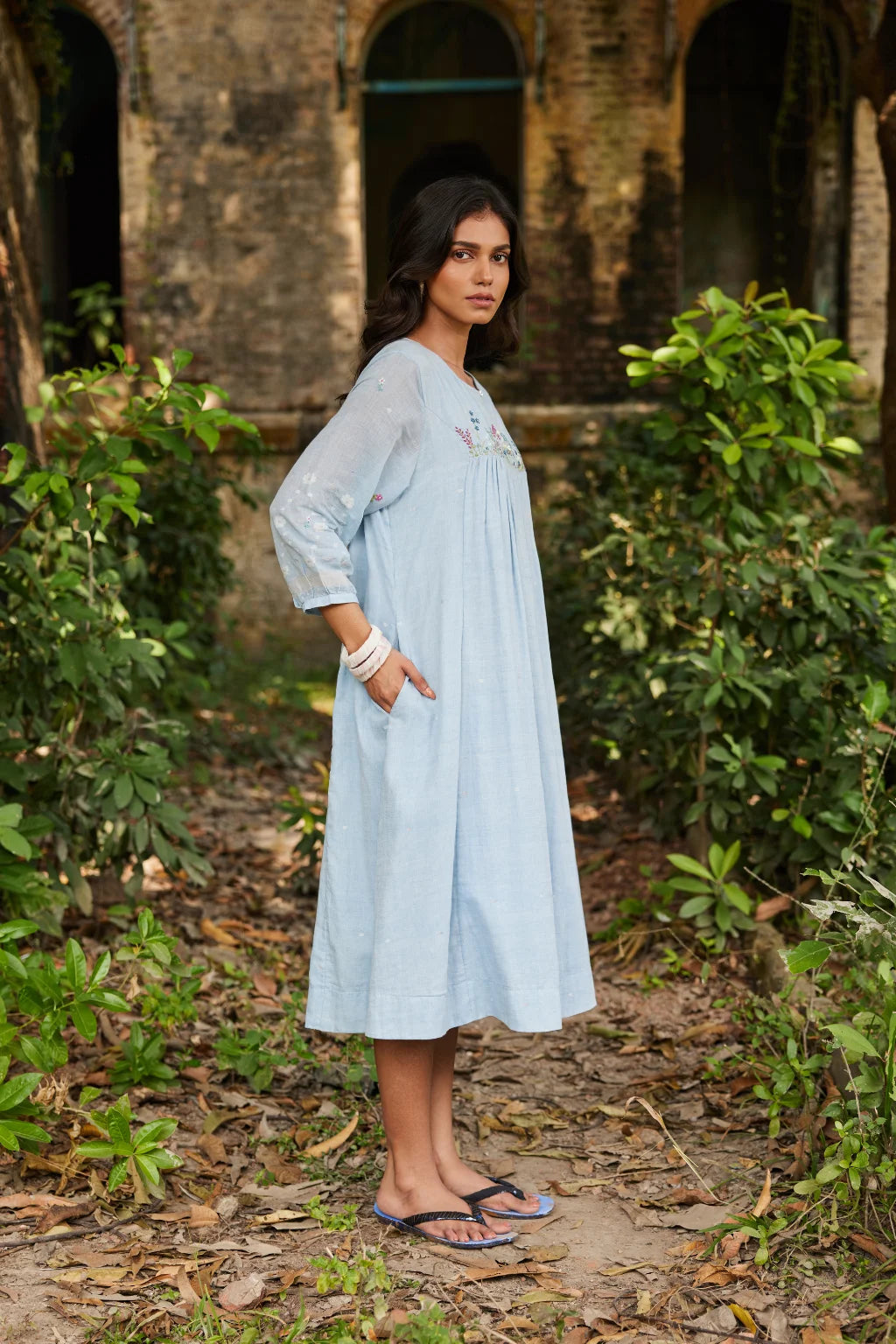 Sarron Kusum Dress, light blue cotton Jamdani dress with white and gold zari floral motifs.