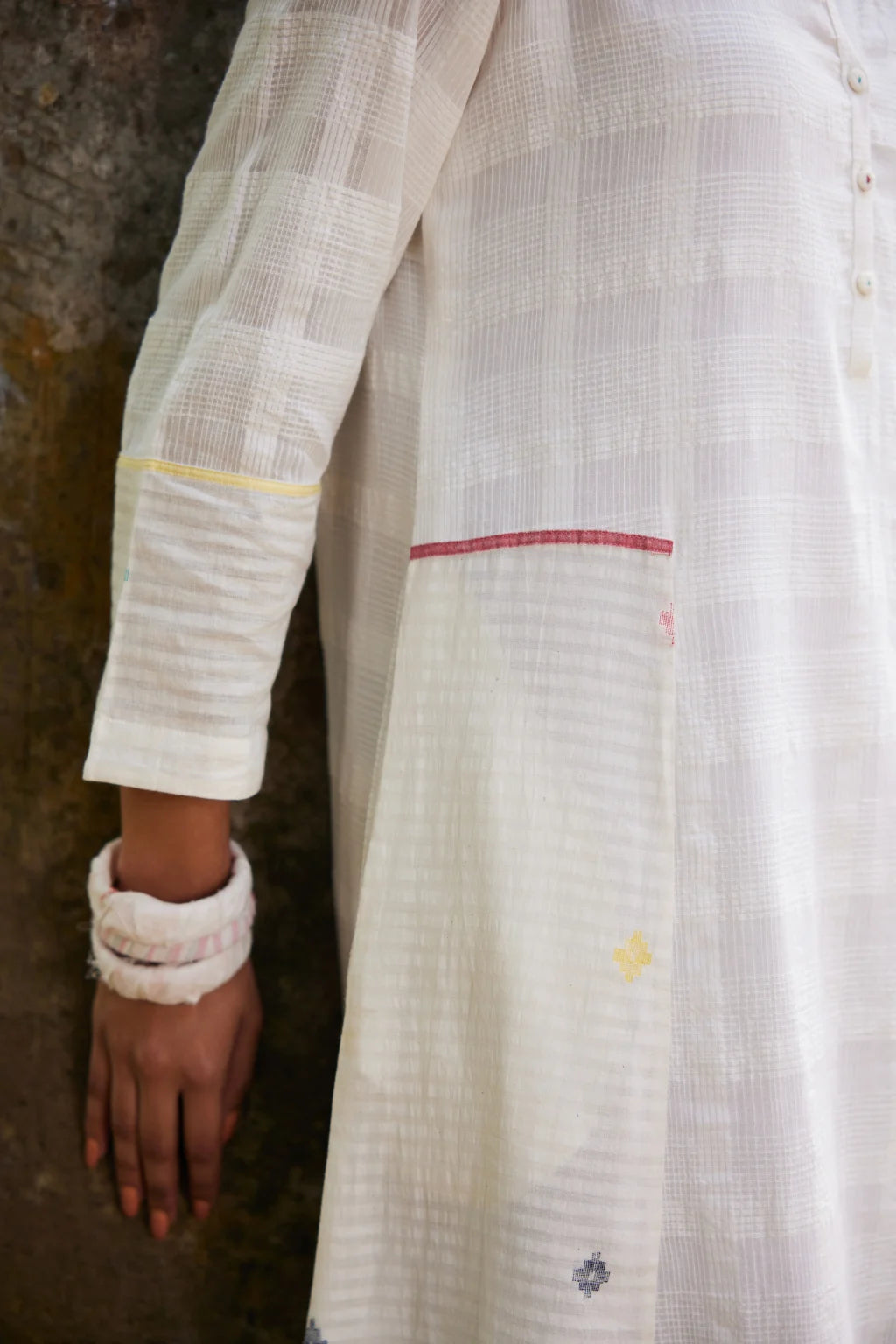 Sarron Lalitha Dress, white patchwork dress in cotton check and cotton Jamdani with geometric motifs.