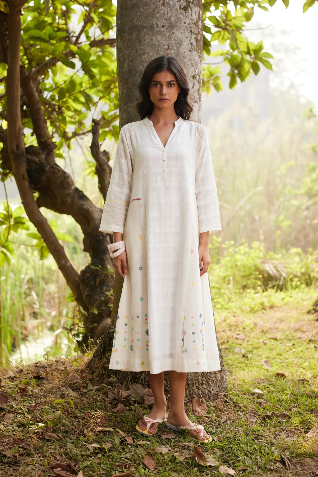 Sarron Lalitha Dress, white patchwork dress in cotton check and cotton Jamdani with geometric motifs.