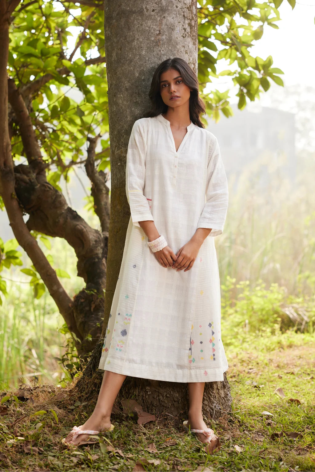 Sarron Lalitha Dress, white patchwork dress in cotton check and cotton Jamdani with geometric motifs.