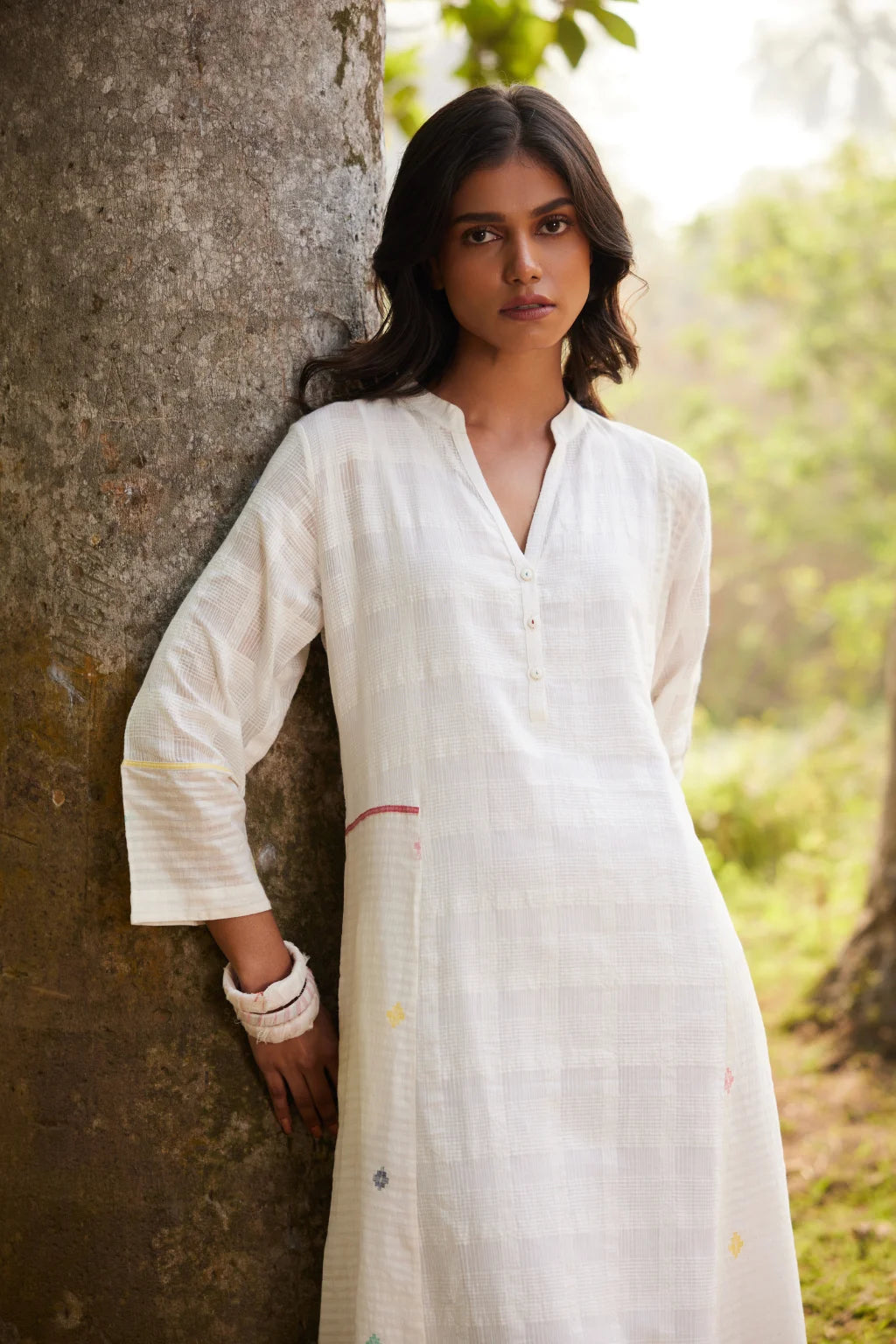 Sarron Lalitha Dress, white patchwork dress in cotton check and cotton Jamdani with geometric motifs.