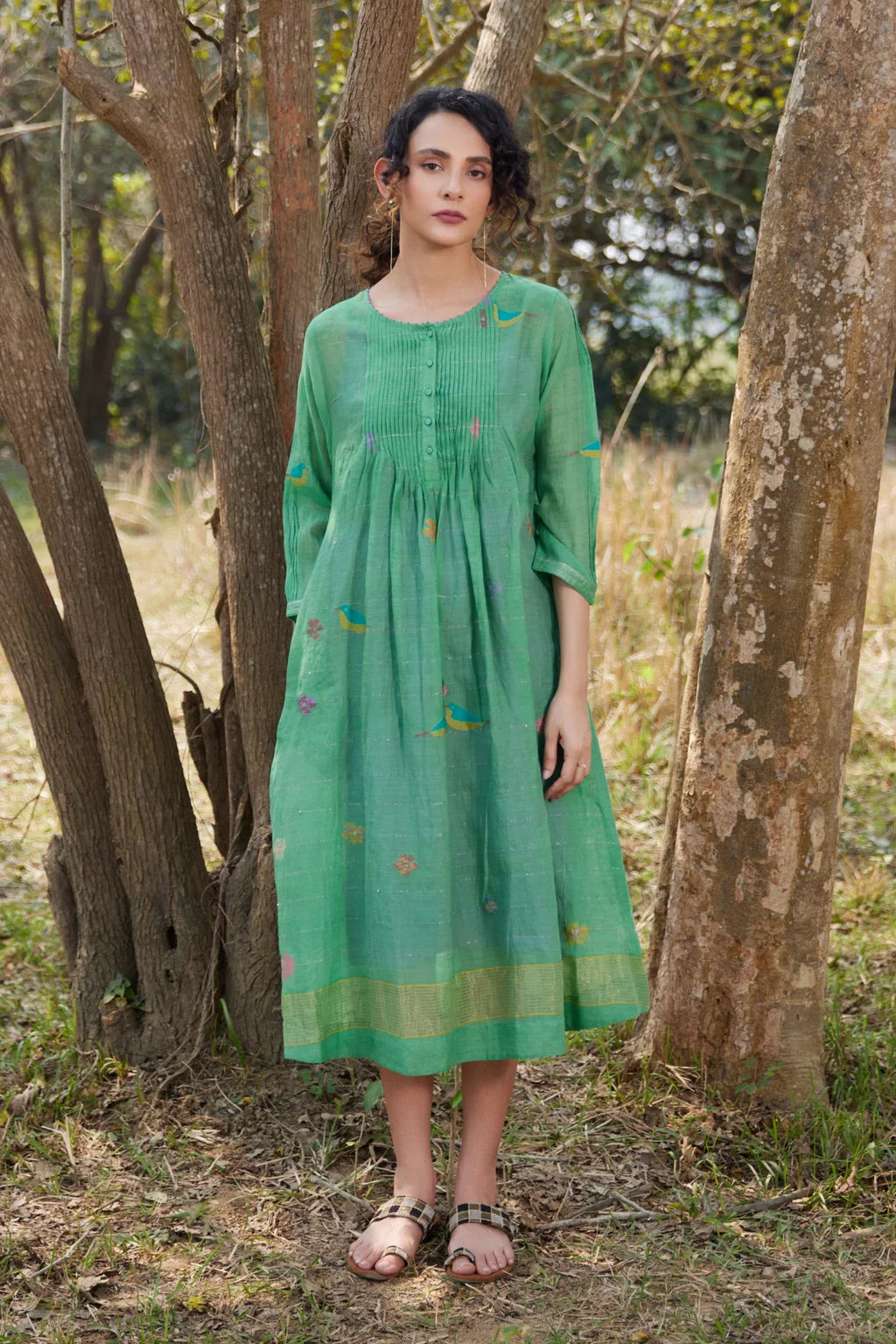 Sarron Mamata Dress, green silk-cotton Jamdani dress with sheer three-quarter sleeves and golden hem work.