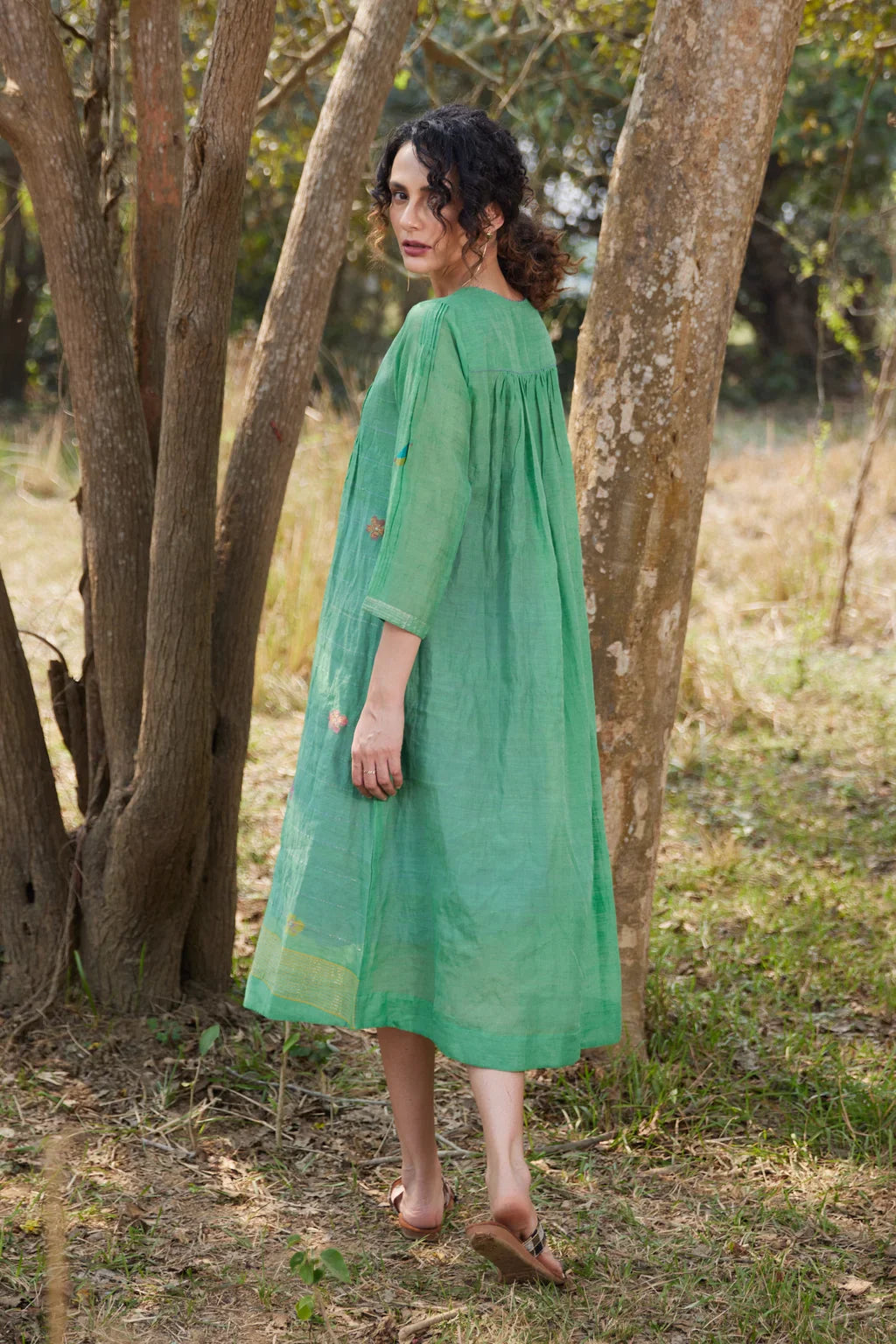Sarron Mamata Dress, green silk-cotton Jamdani dress with sheer three-quarter sleeves and golden hem work.