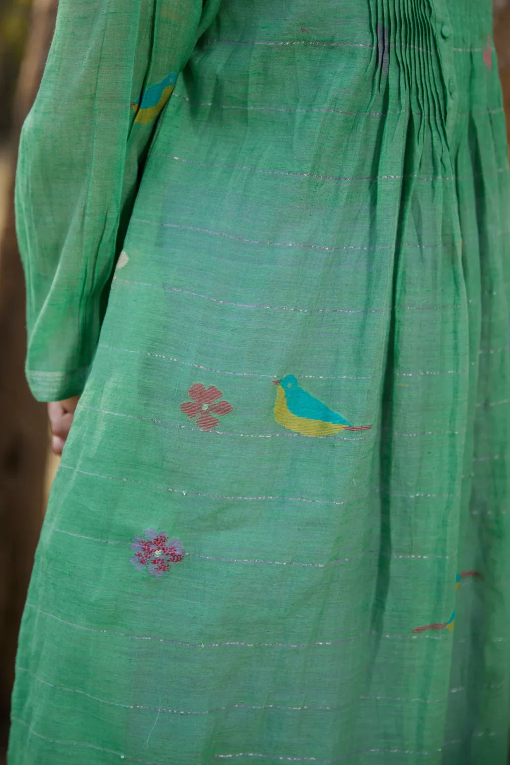 Sarron Mamata Dress, green silk-cotton Jamdani dress with sheer three-quarter sleeves and golden hem work.