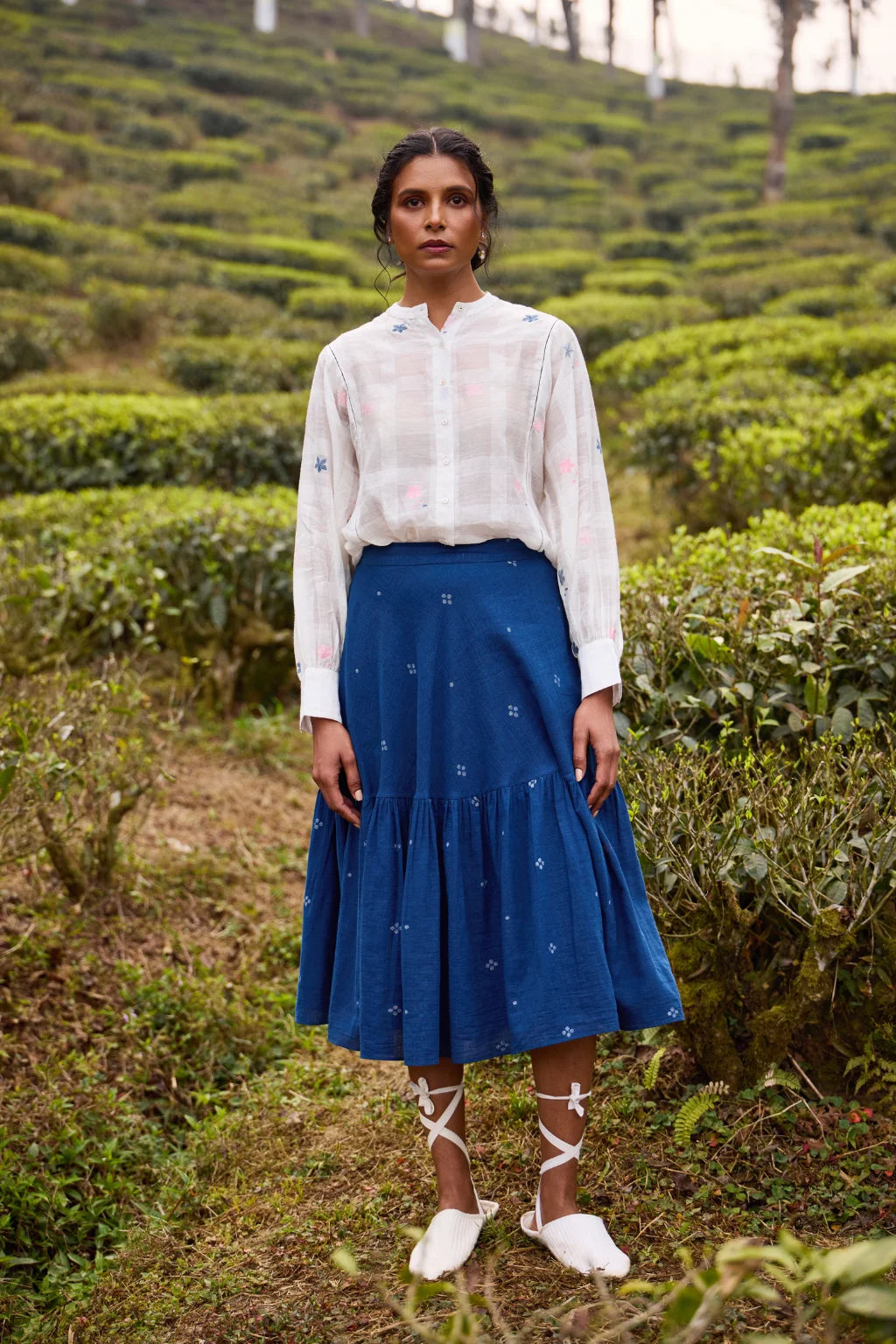 Sarron Neeltara Skirt, dark indigo cotton Jamdani skirt with four-ball Jamdani motifs and side pockets.