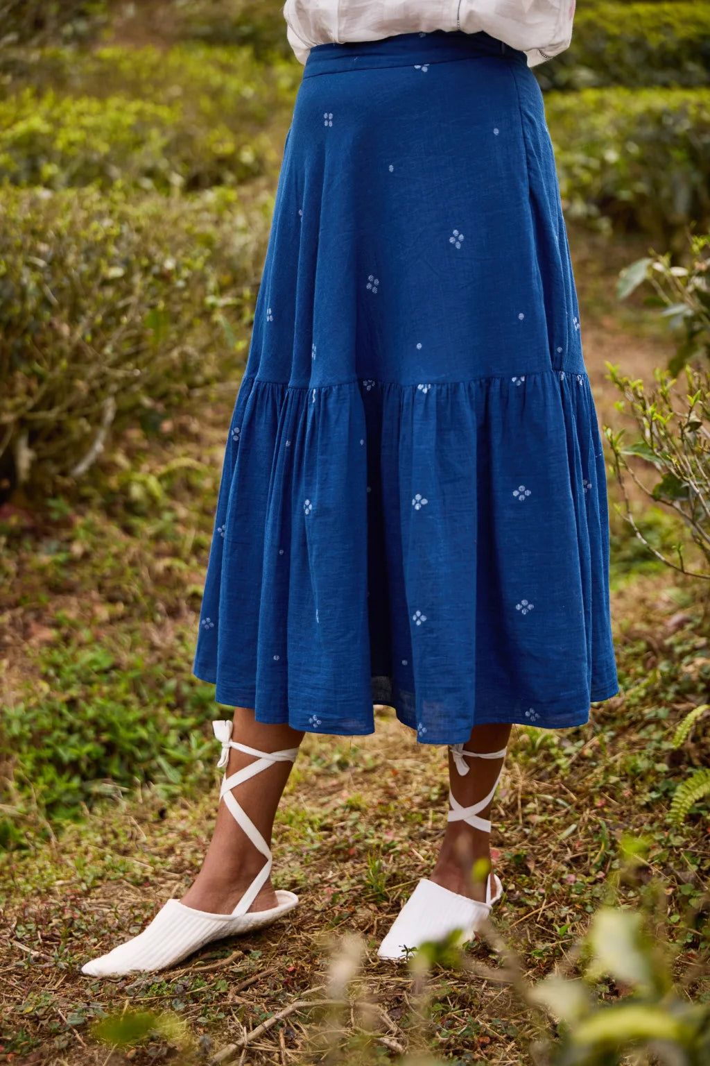 Sarron Neeltara Skirt, dark indigo cotton Jamdani skirt with four-ball Jamdani motifs and side pockets.