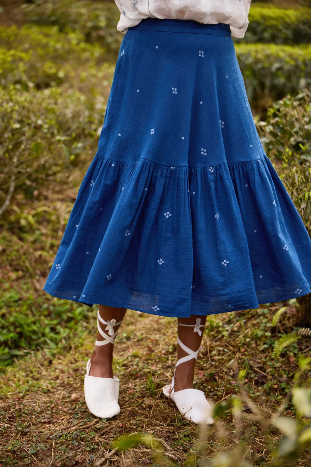 Sarron Neeltara Skirt, dark indigo cotton Jamdani skirt with four-ball Jamdani motifs and side pockets.