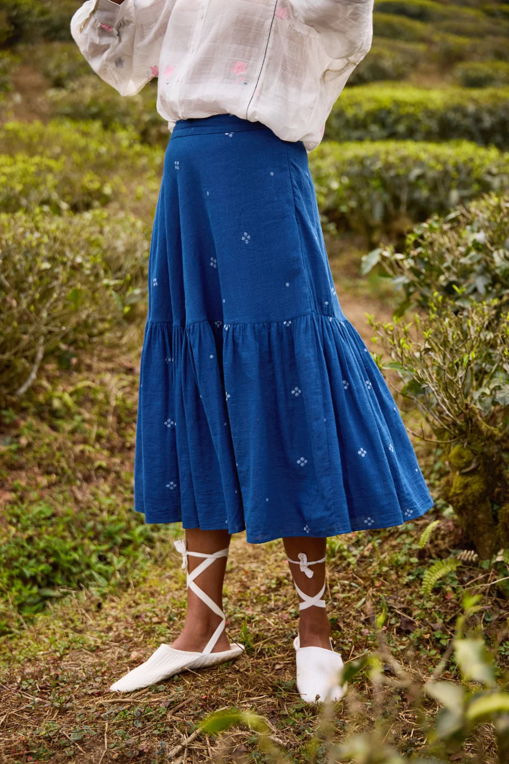 Sarron Neeltara Skirt, dark indigo cotton Jamdani skirt with four-ball Jamdani motifs and side pockets.
