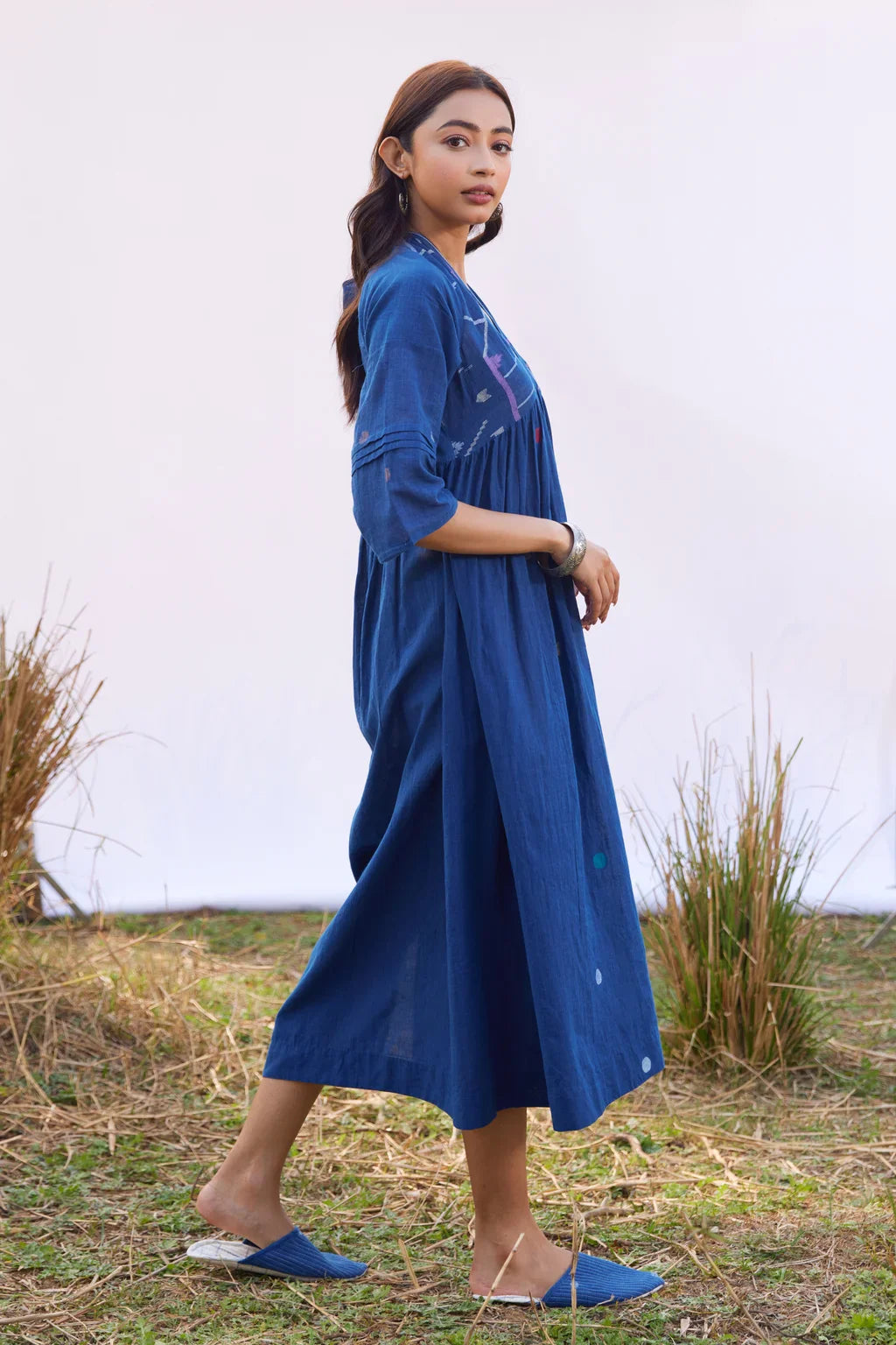Sarron Nilu Dress, dark indigo cotton Jamdani dress with scattered geometric motifs and side slits.