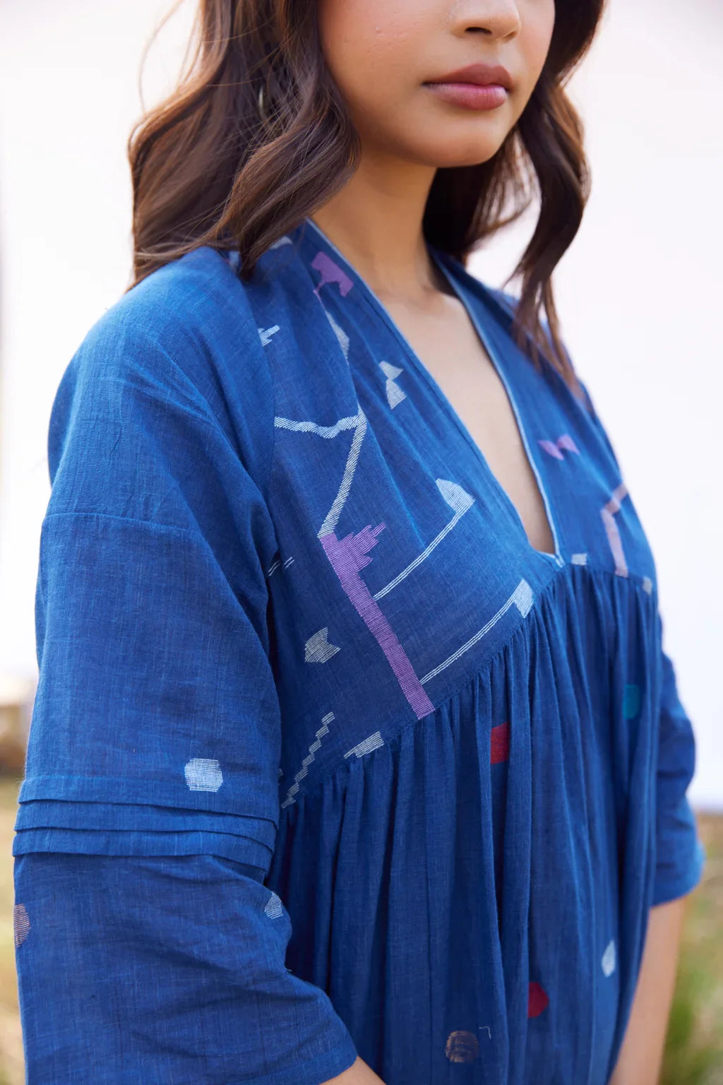 Sarron Nilu Dress, dark indigo cotton Jamdani dress with scattered geometric motifs and side slits.