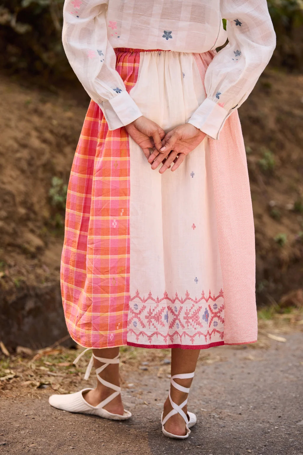 Sarron Phulkoli Skirt, panelled cotton Jamdani skirt in white, pink and red with woven Jamdani borders.