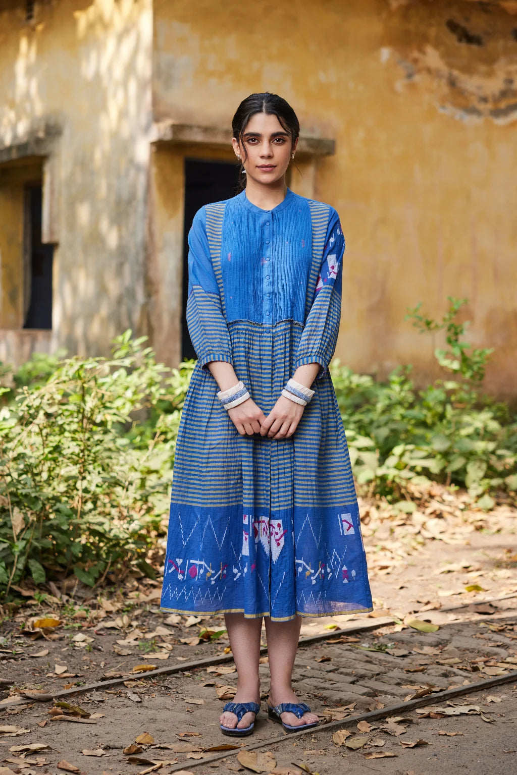 Sarron Priya Dress, blue patchwork dress in cotton Jamdani and striped handloom cotton with pintucks.