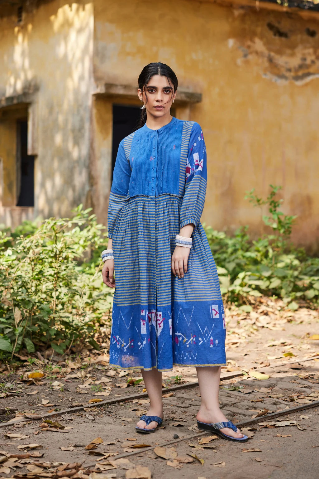 Sarron Priya Dress, blue patchwork dress in cotton Jamdani and striped handloom cotton with pintucks.