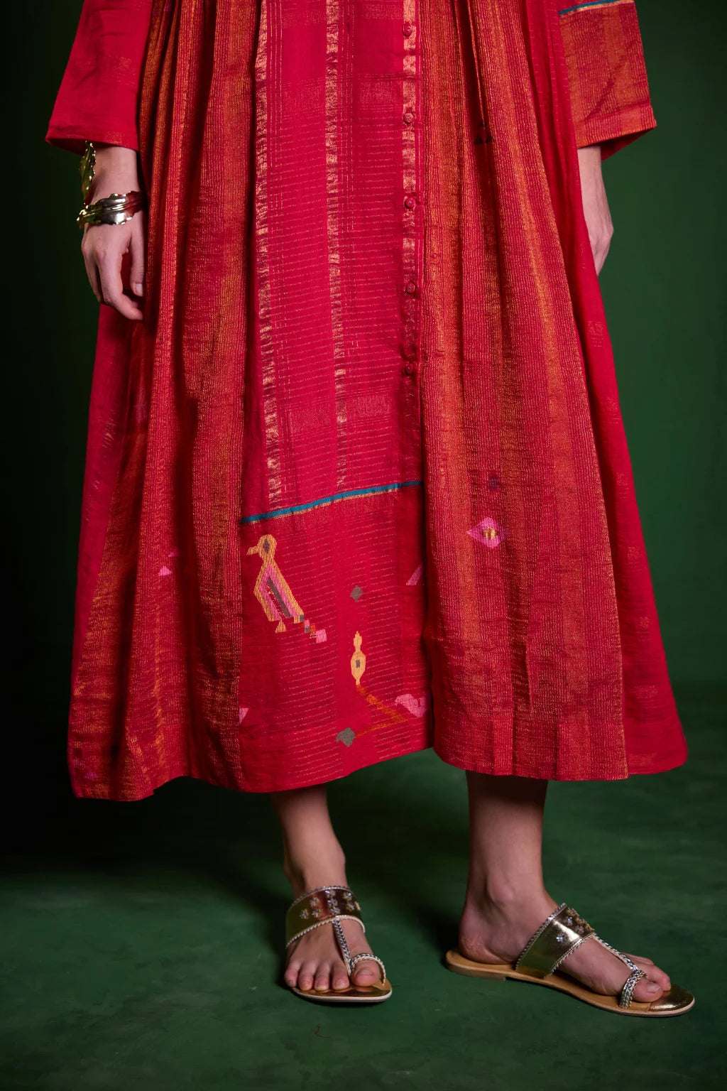 Sarron Ragini Dress, red silk-cotton Jamdani dress with handwoven bird and floral motifs and zari stripes.