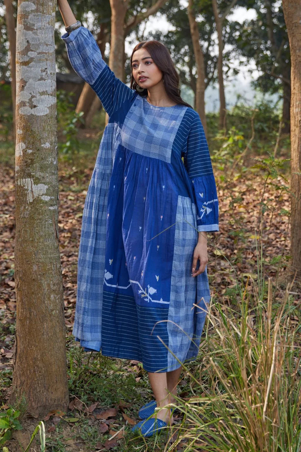 Sarron Ritu Dress, blue and grey striped cotton Jamdani maxi dress with a flared hem and side pockets.