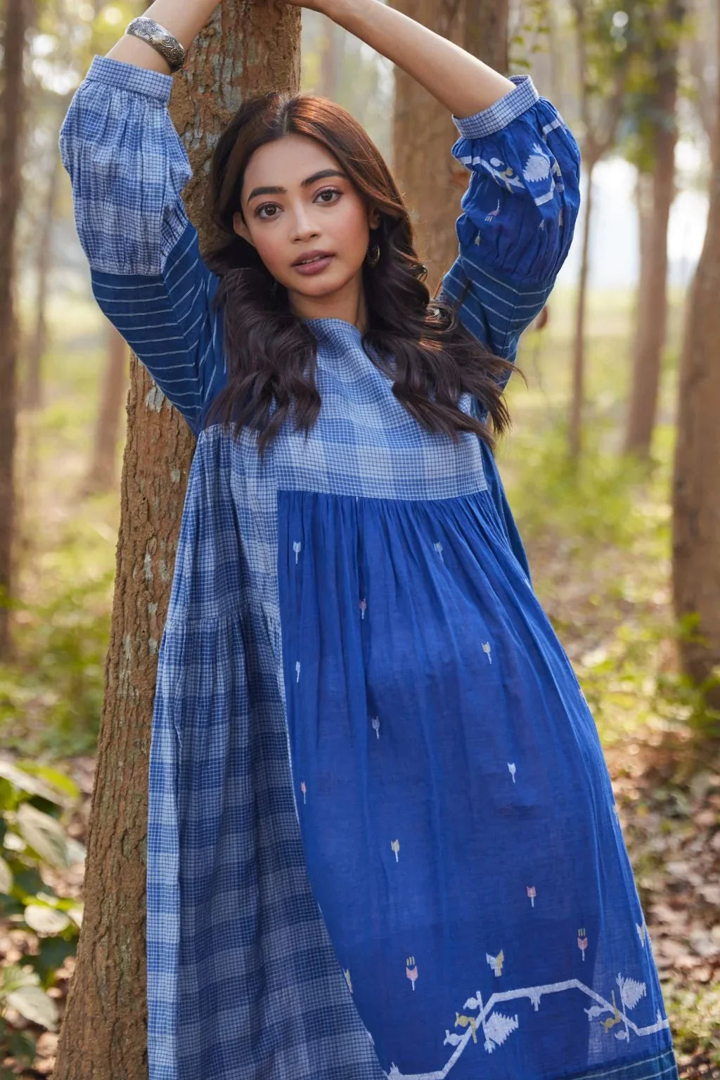 Sarron Ritu Dress, blue and grey striped cotton Jamdani maxi dress with a flared hem and side pockets.