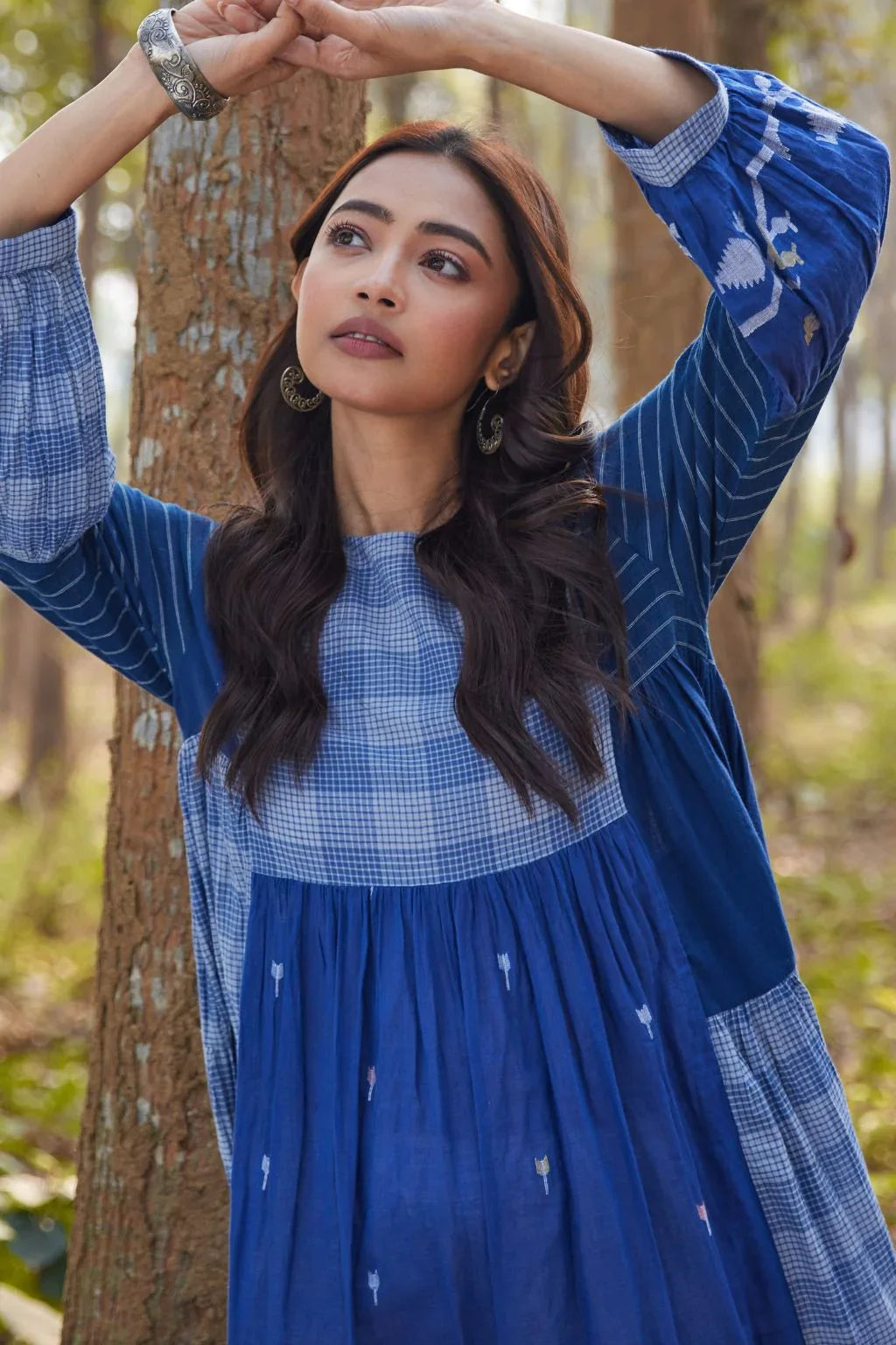 Sarron Ritu Dress, blue and grey striped cotton Jamdani maxi dress with a flared hem and side pockets.