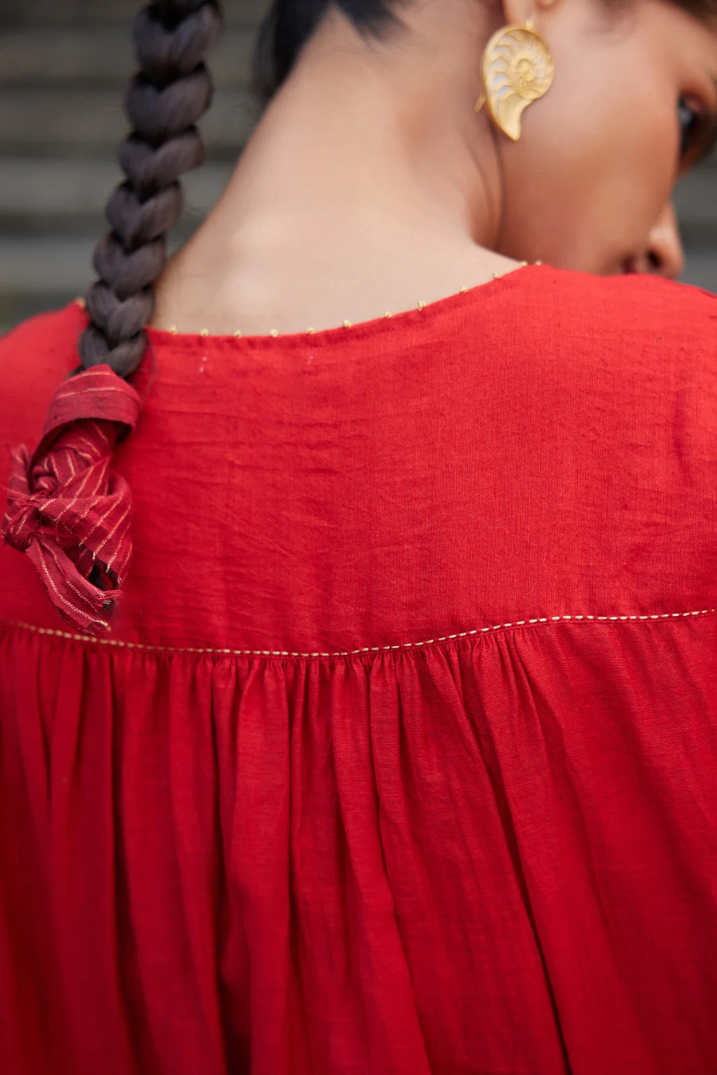 Sarron Ruhani Dress, red silk-cotton placement Jamdani dress with large floral butas and zari Kantha embroidery.