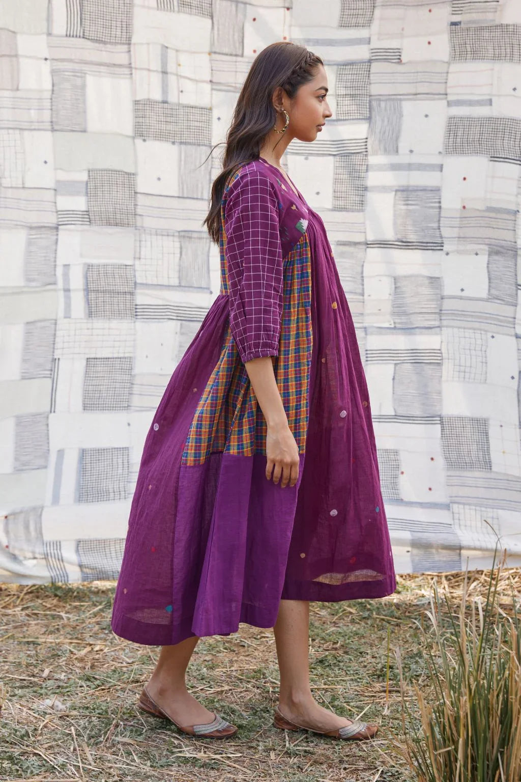 Sarron Sana Dress, red cotton Jamdani dress with multicoloured stripe panels and a V-neckline.