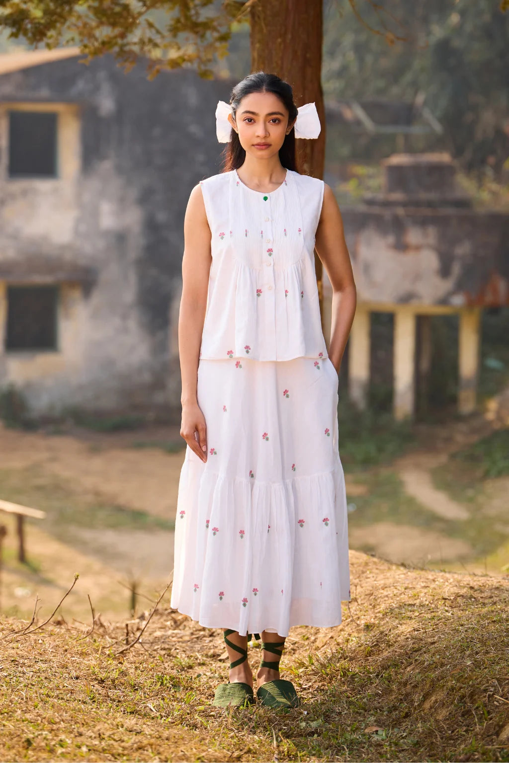 Sarron Shiuli Skirt, white flared cotton Jamdani skirt with geometric flower motifs and side pockets.