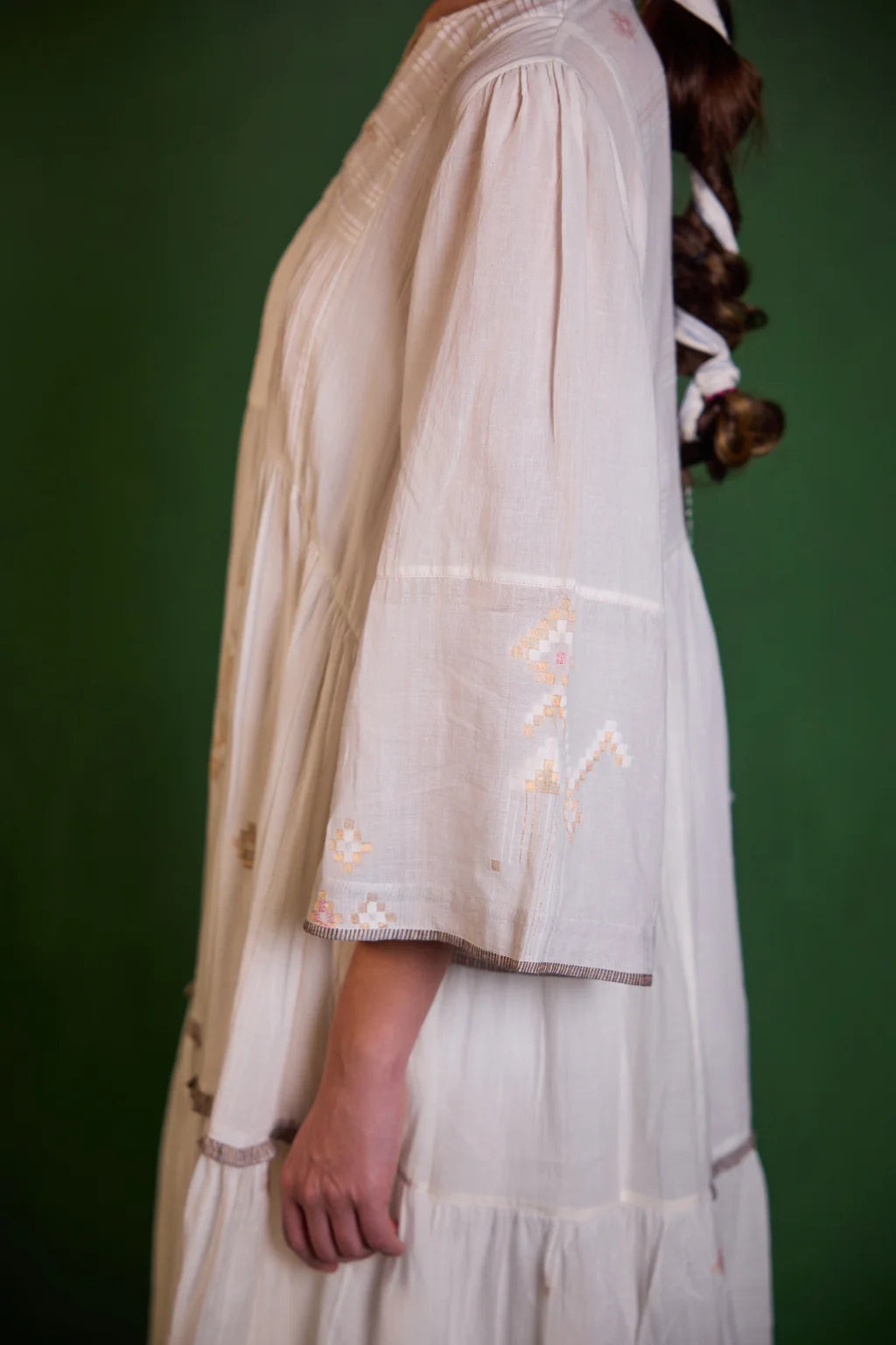 Sarron Shubhra Dress, ivory white silk-cotton Jamdani dress with ghicha zari motifs and a tiered cut.