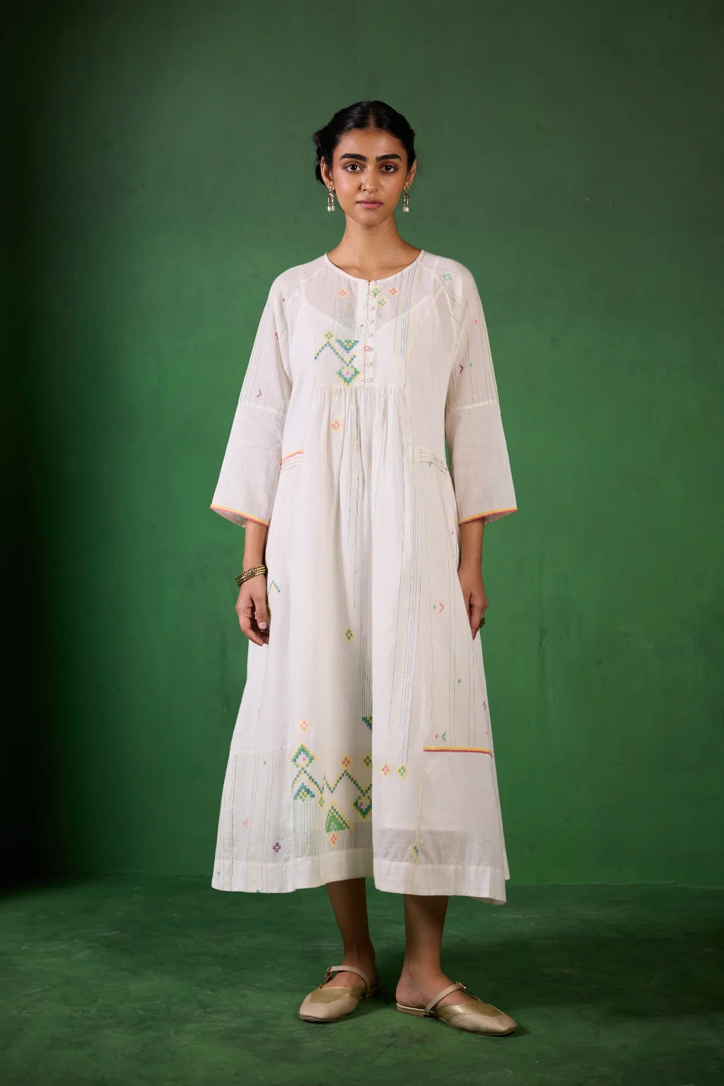 Sarron Shuchi Dress, soft white silk-cotton Jamdani dress with large handwoven motifs and raglan sleeves.