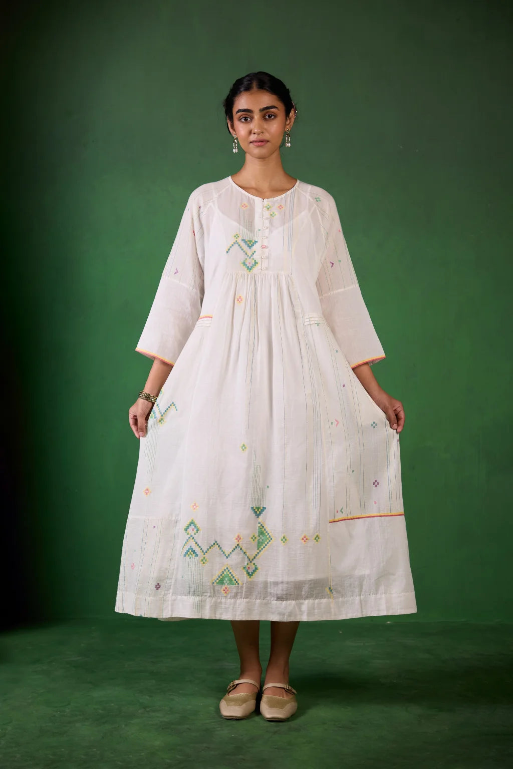 Sarron Shuchi Dress, soft white silk-cotton Jamdani dress with large handwoven motifs and raglan sleeves.