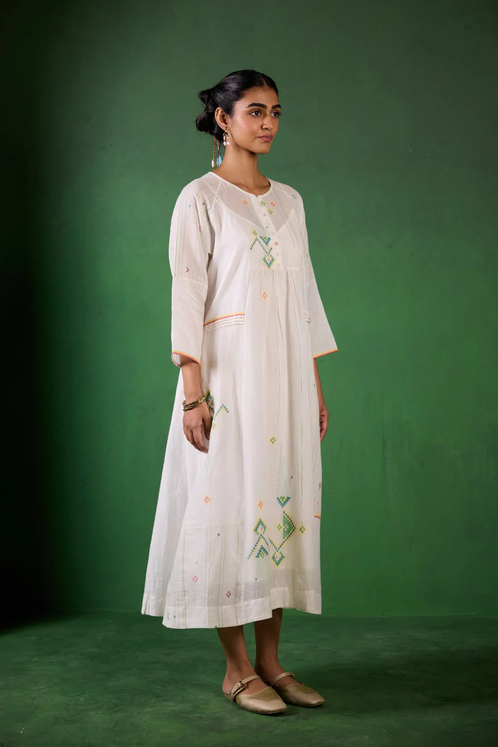 Sarron Shuchi Dress, soft white silk-cotton Jamdani dress with large handwoven motifs and raglan sleeves.