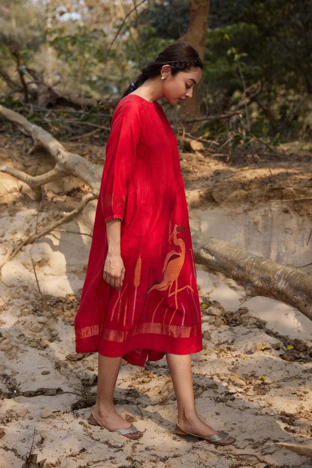 Sarron Susmita Dress, red silk-cotton Jamdani dress with a handwoven flamingo motif and a flared hem.