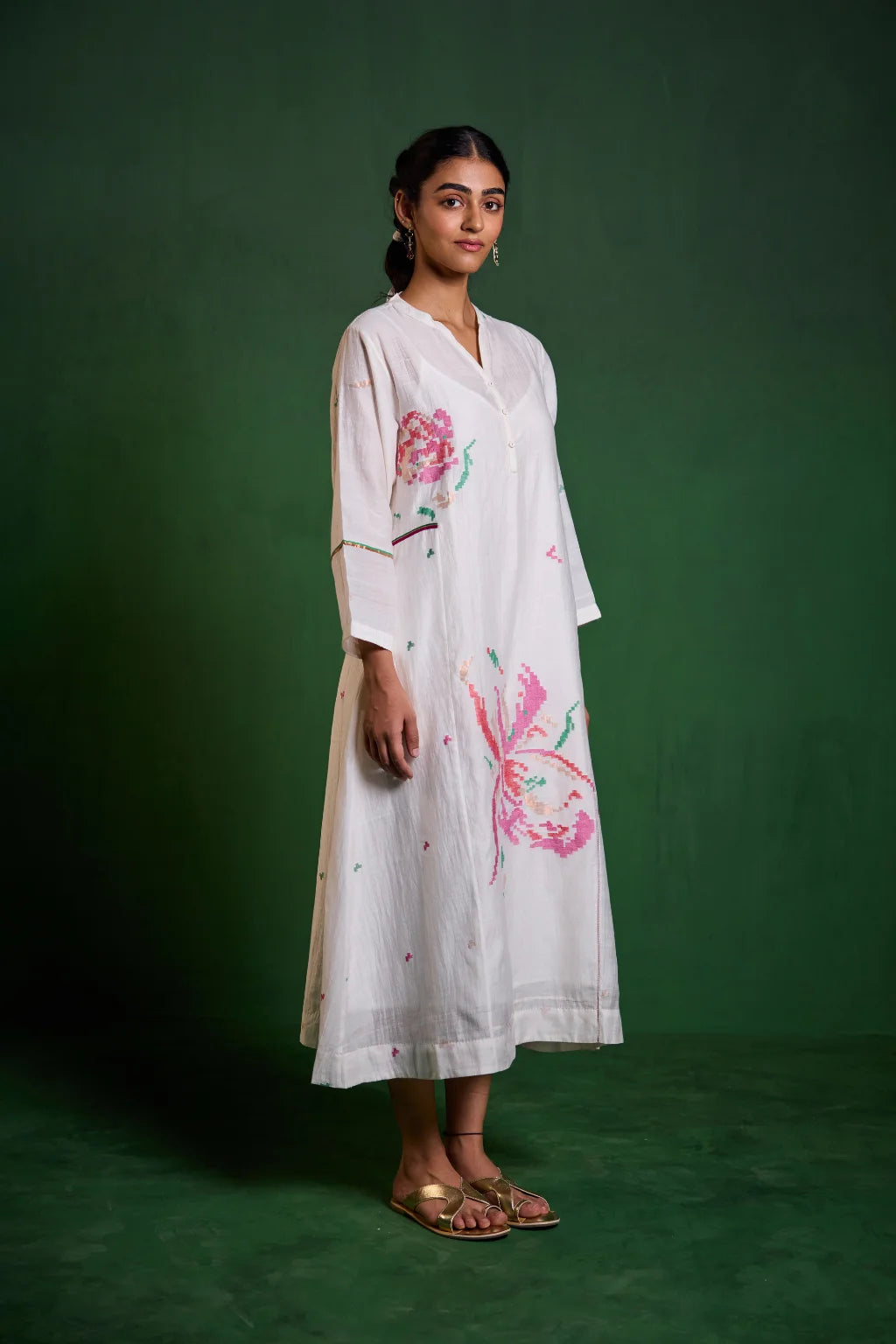 Sarron Uma Dress, white silk-cotton Jamdani dress with large floral graph motifs and a split neckline.