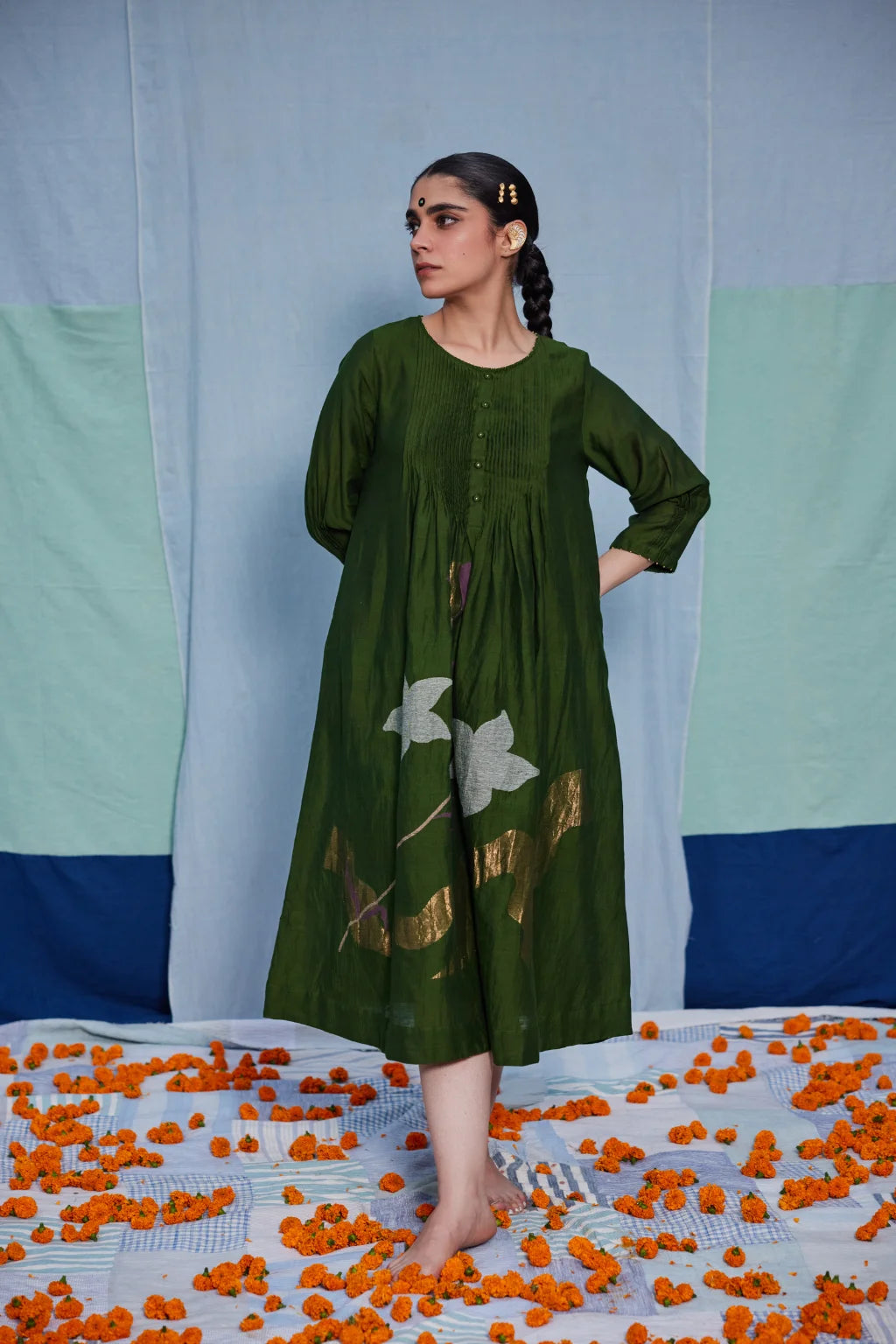 Sarron Vrinda Dress, dark olive silk-cotton Jamdani dress with a large floral placement buta.