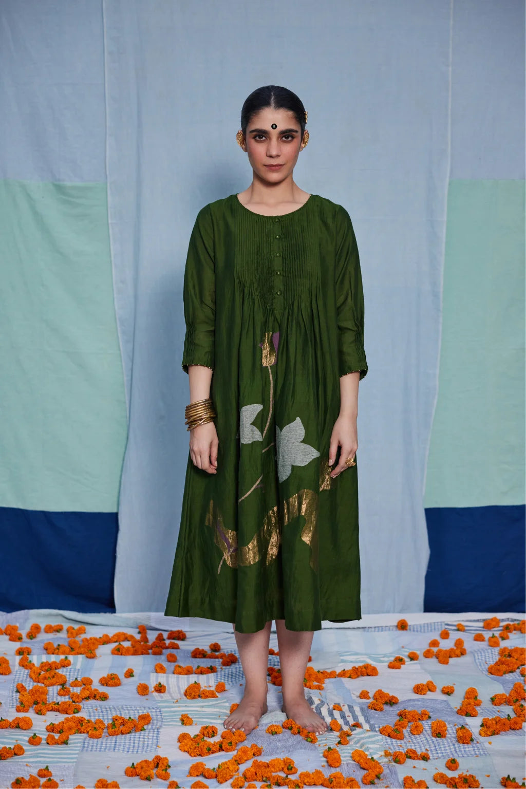 Sarron Vrinda Dress, dark olive silk-cotton Jamdani dress with a large floral placement buta.