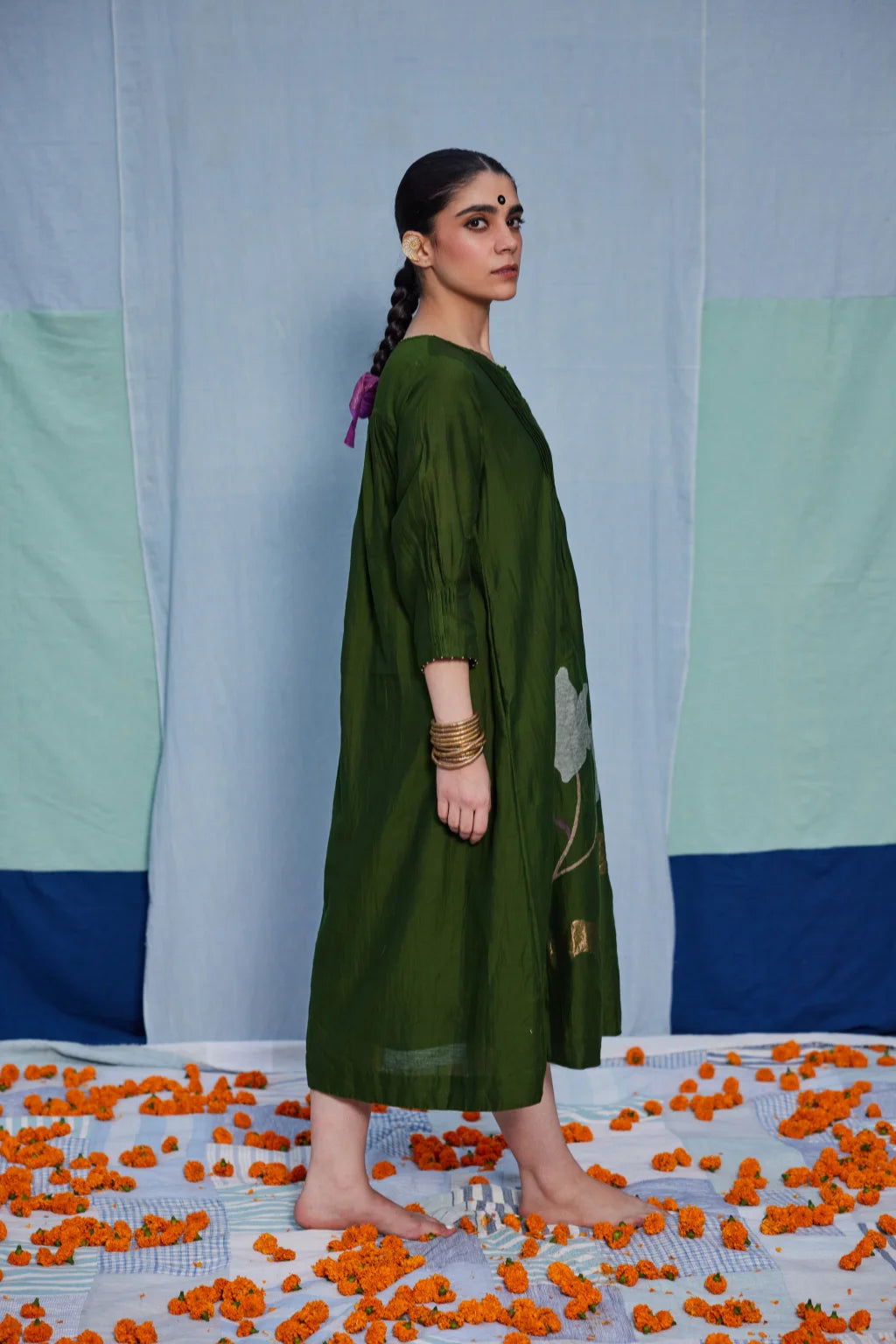 Sarron Vrinda Dress, dark olive silk-cotton Jamdani dress with a large floral placement buta.