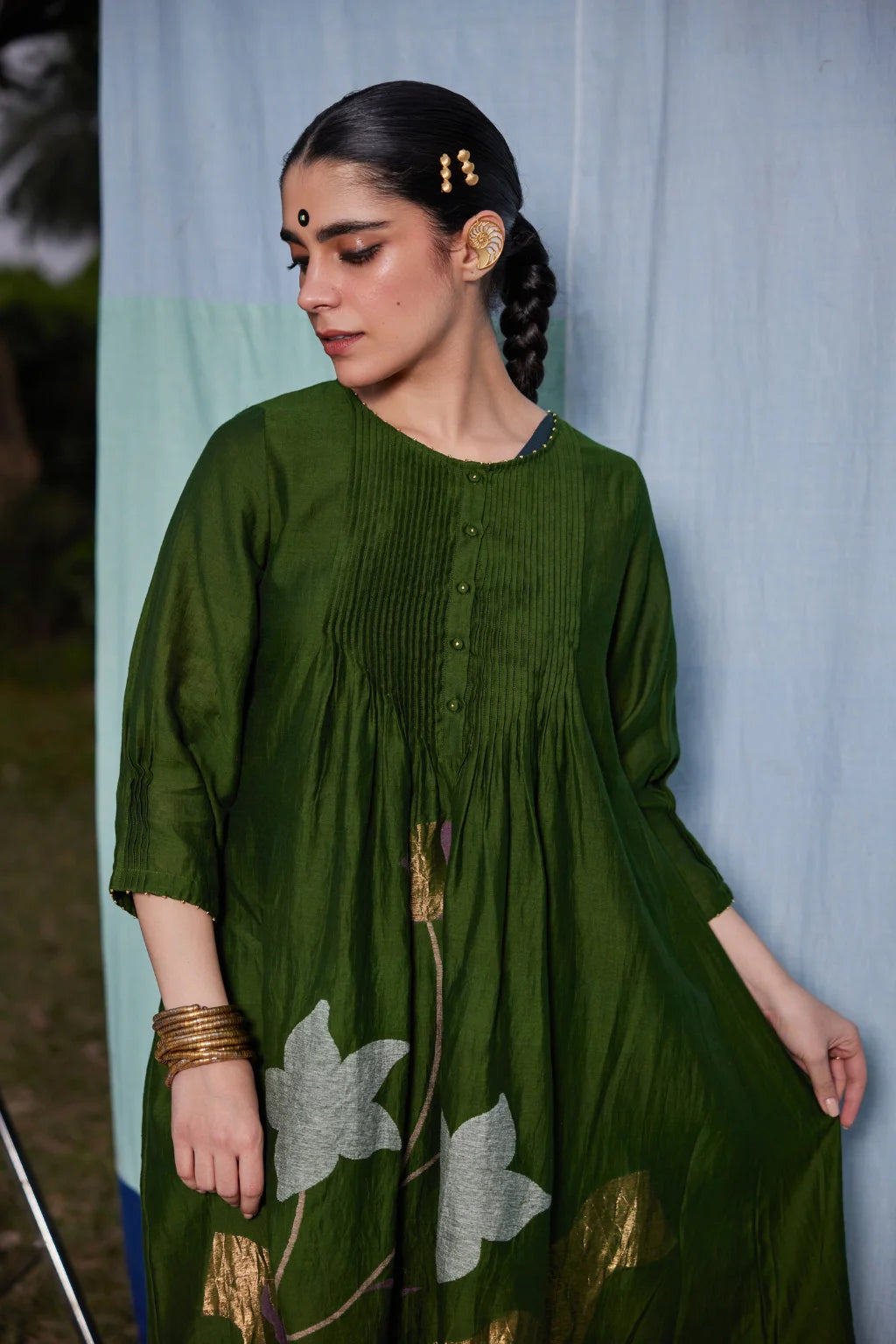 Sarron Vrinda Dress, dark olive silk-cotton Jamdani dress with a large floral placement buta.