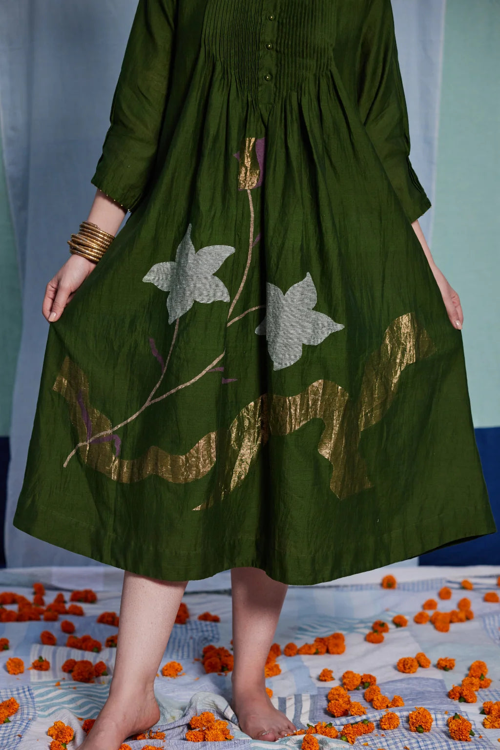 Sarron Vrinda Dress, dark olive silk-cotton Jamdani dress with a large floral placement buta.