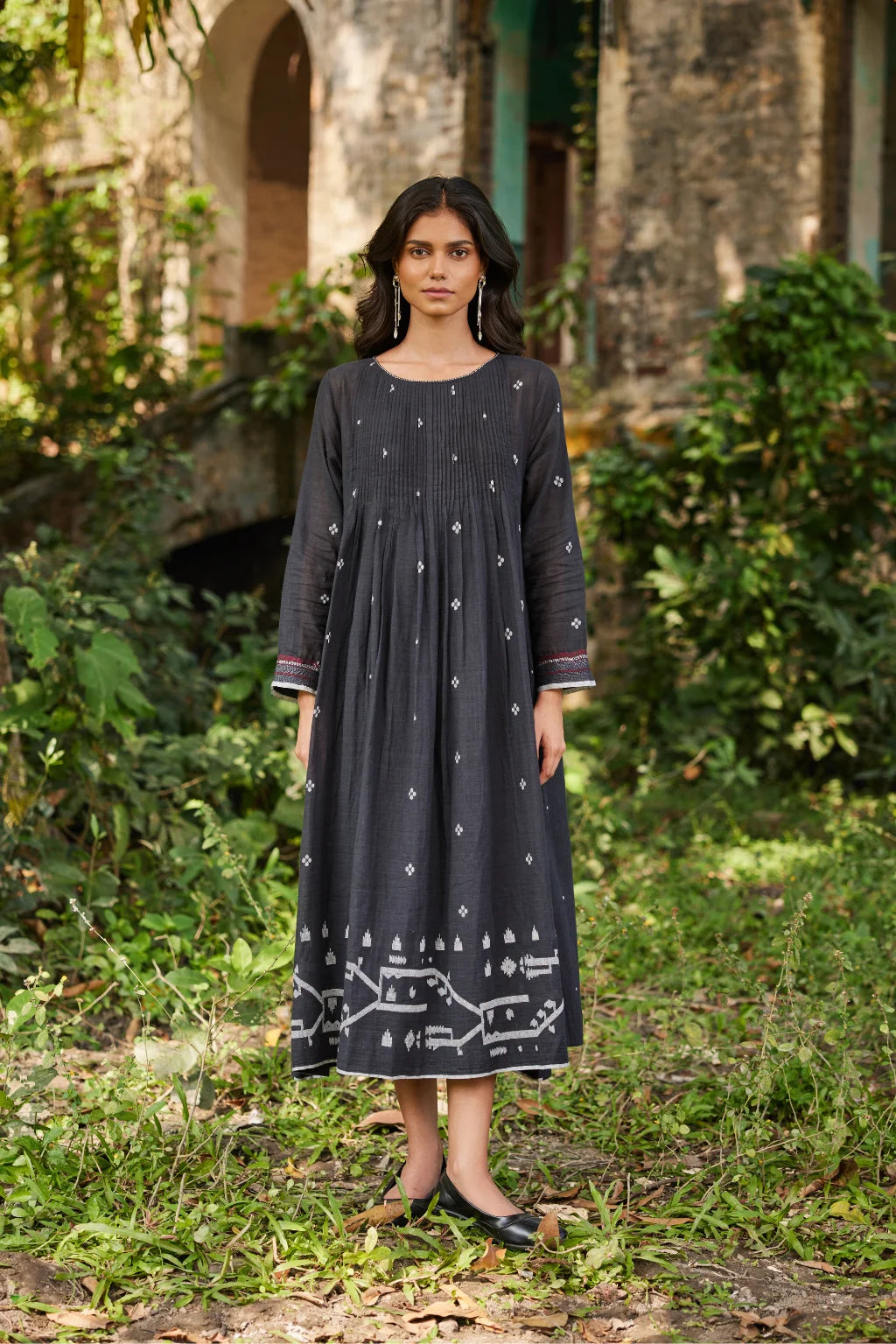 Sarron Zuri Dress, black cotton Jamdani dress with geometric butas, pintucks and Kantha hand embroidery.