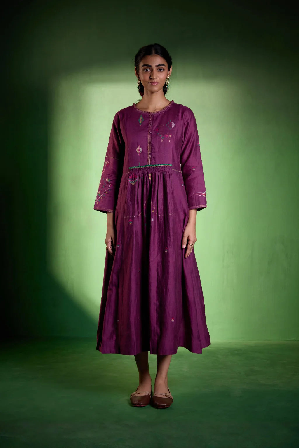 Sarron Amrita Dress, plum purple silk-cotton Jamdani dress with geometric motifs and a gathered waist.
