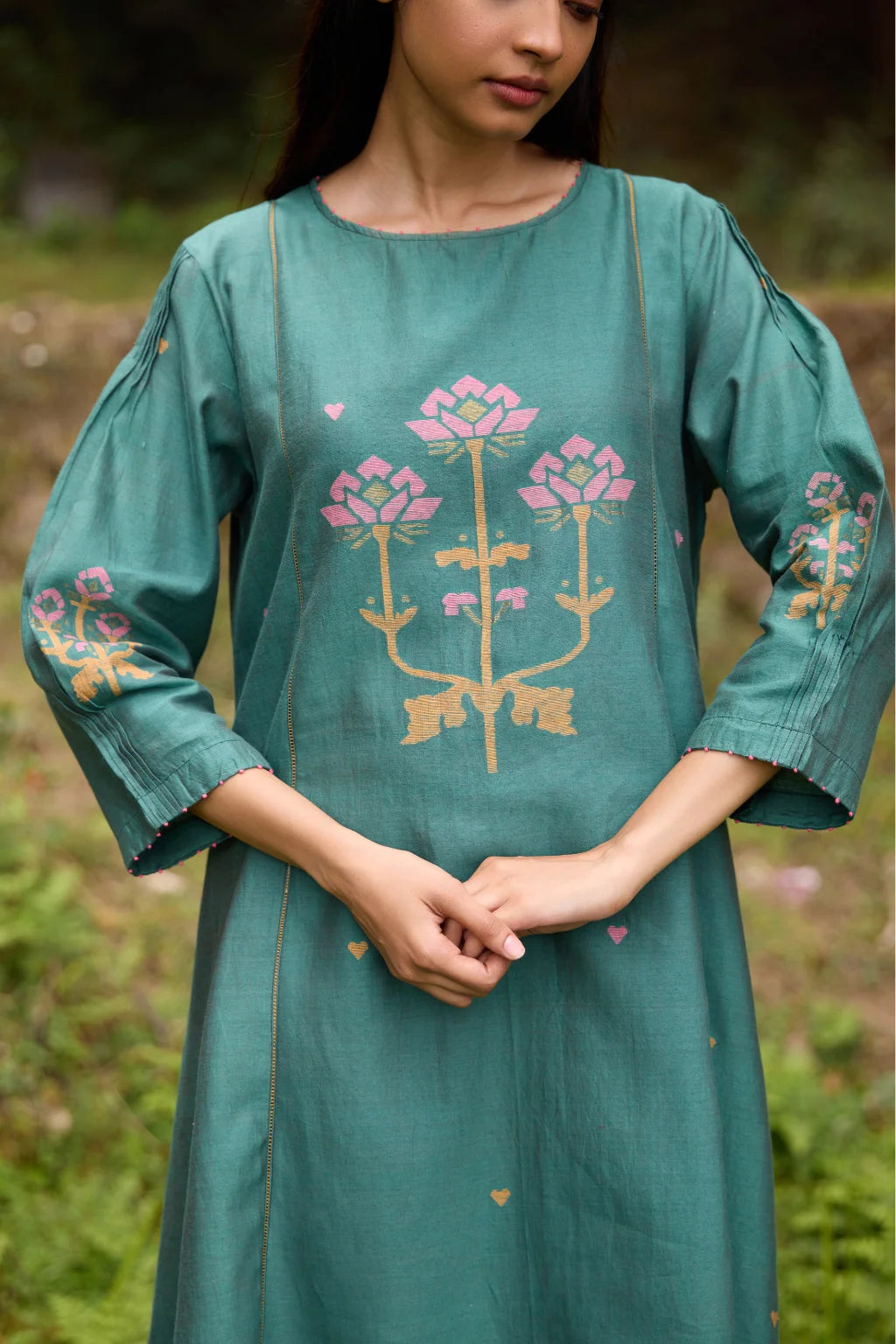 Sarron Anitha Dress, forest green silk-cotton Jamdani panelled dress with floral and heart-shaped motifs.
